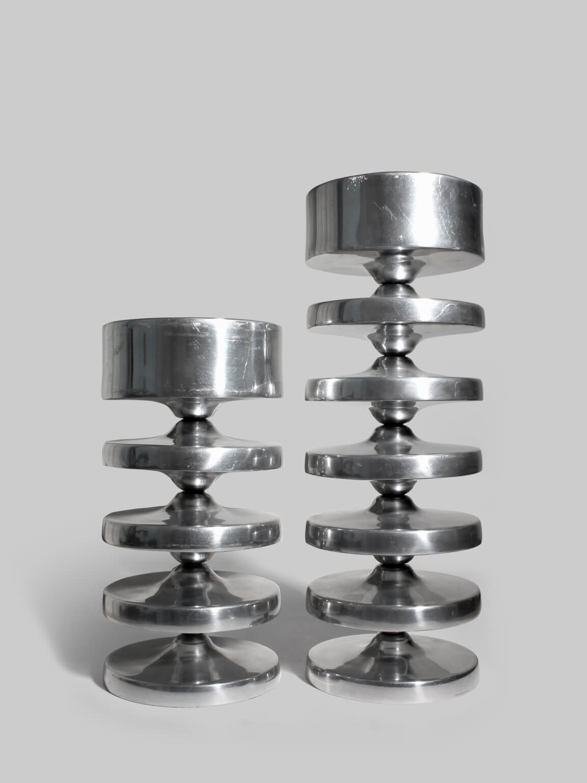 Pair Of Aluminum Contemporary Rimmed Stands by Vintage Stories | The Oblist