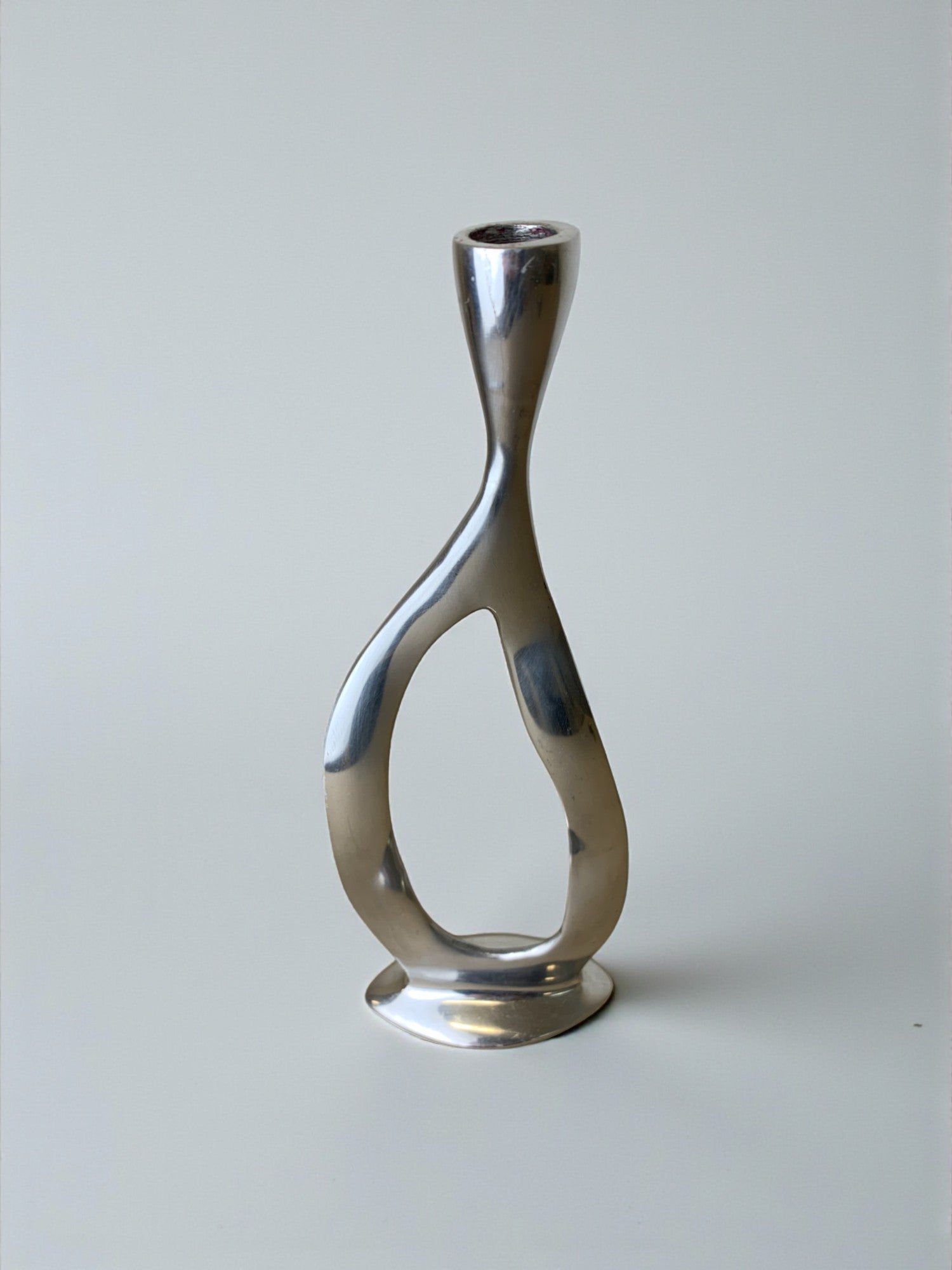 Biomorphic Candleholder, Aluminum, Spain, Circa 1970s — side angle showing smooth metallic finish
