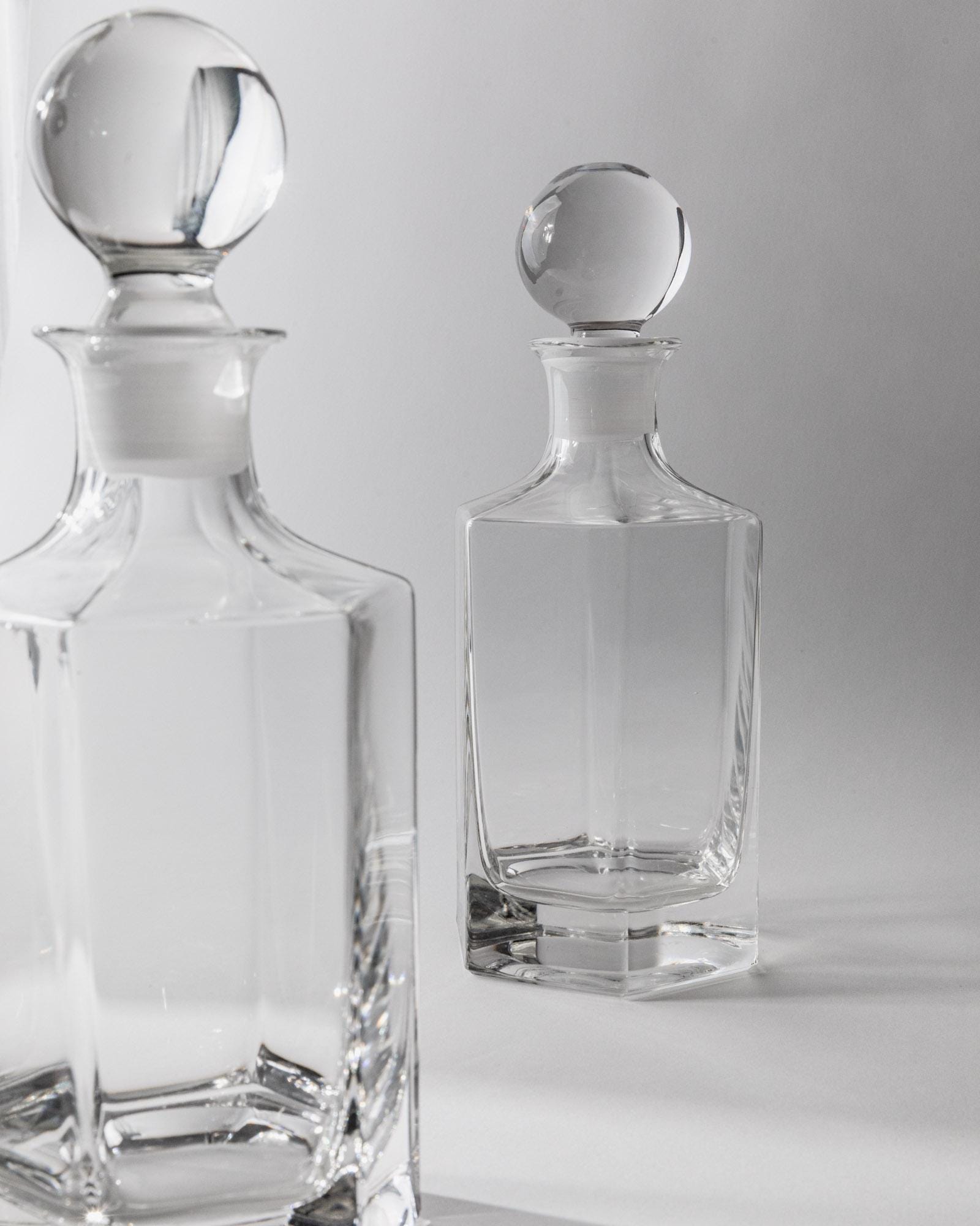 1970s Glass Decanter Set of 2 — top view of clear glass decanters