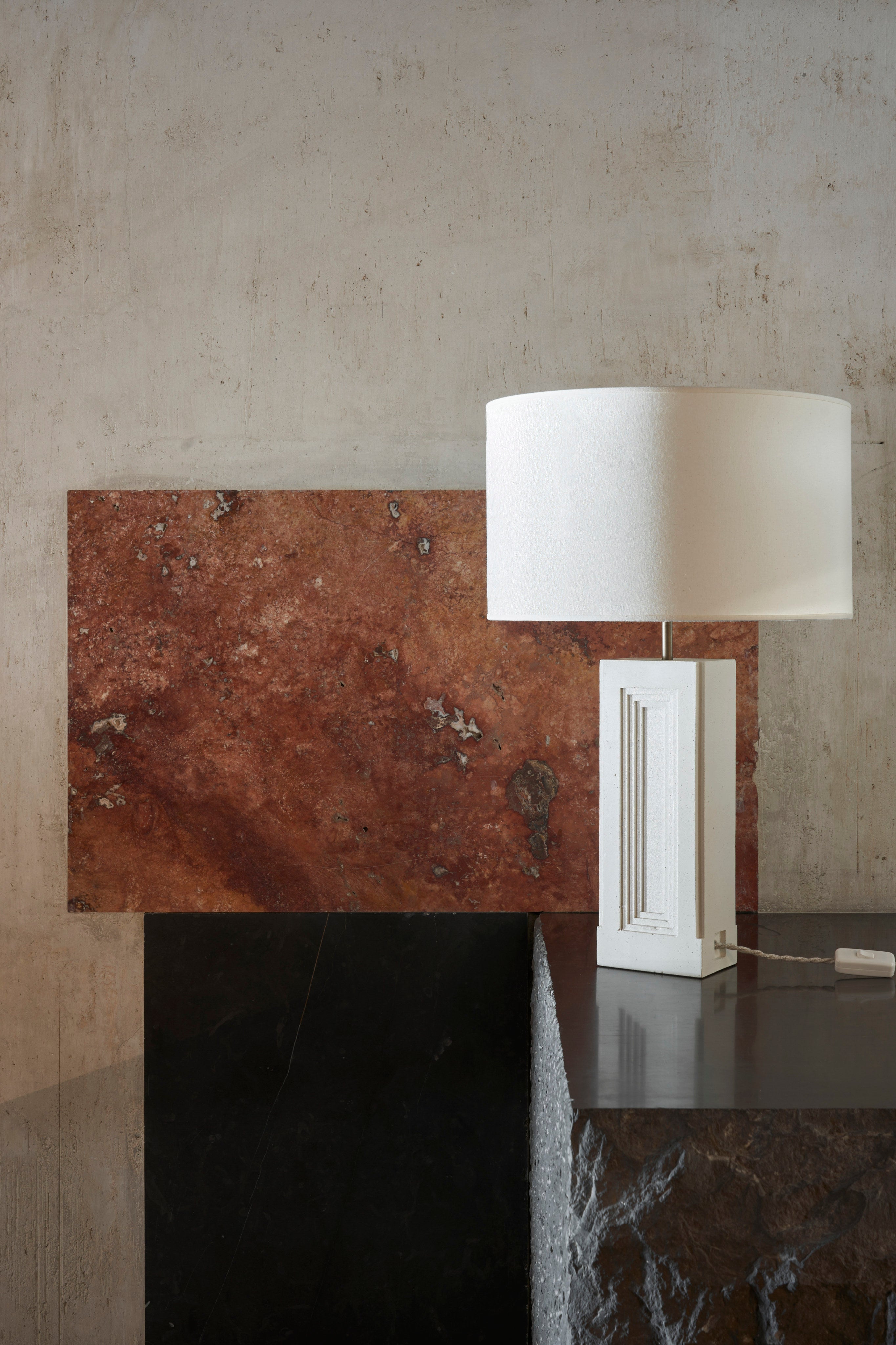Nini Lamp — top view on textured stone surface