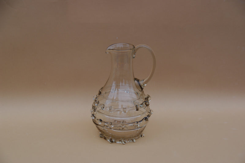 Contemporary Carafes in Glass with ornaments - Mouthblown Collection — side view highlighting glass texture and decorative el