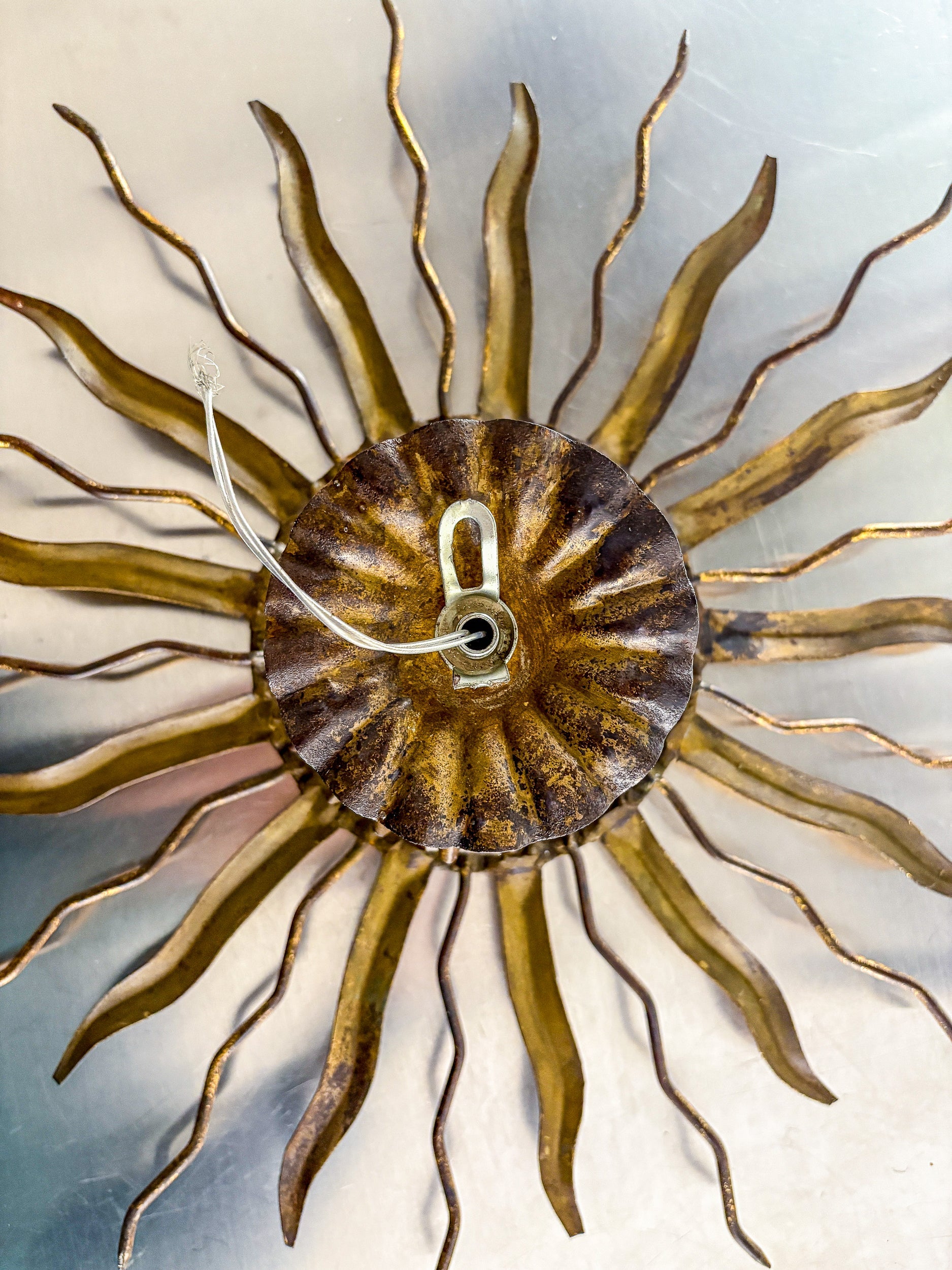 Brutalist Sunburst Ceiling Light – Gilt Iron Rays & Exposed Bulb, France, 1960s — in context