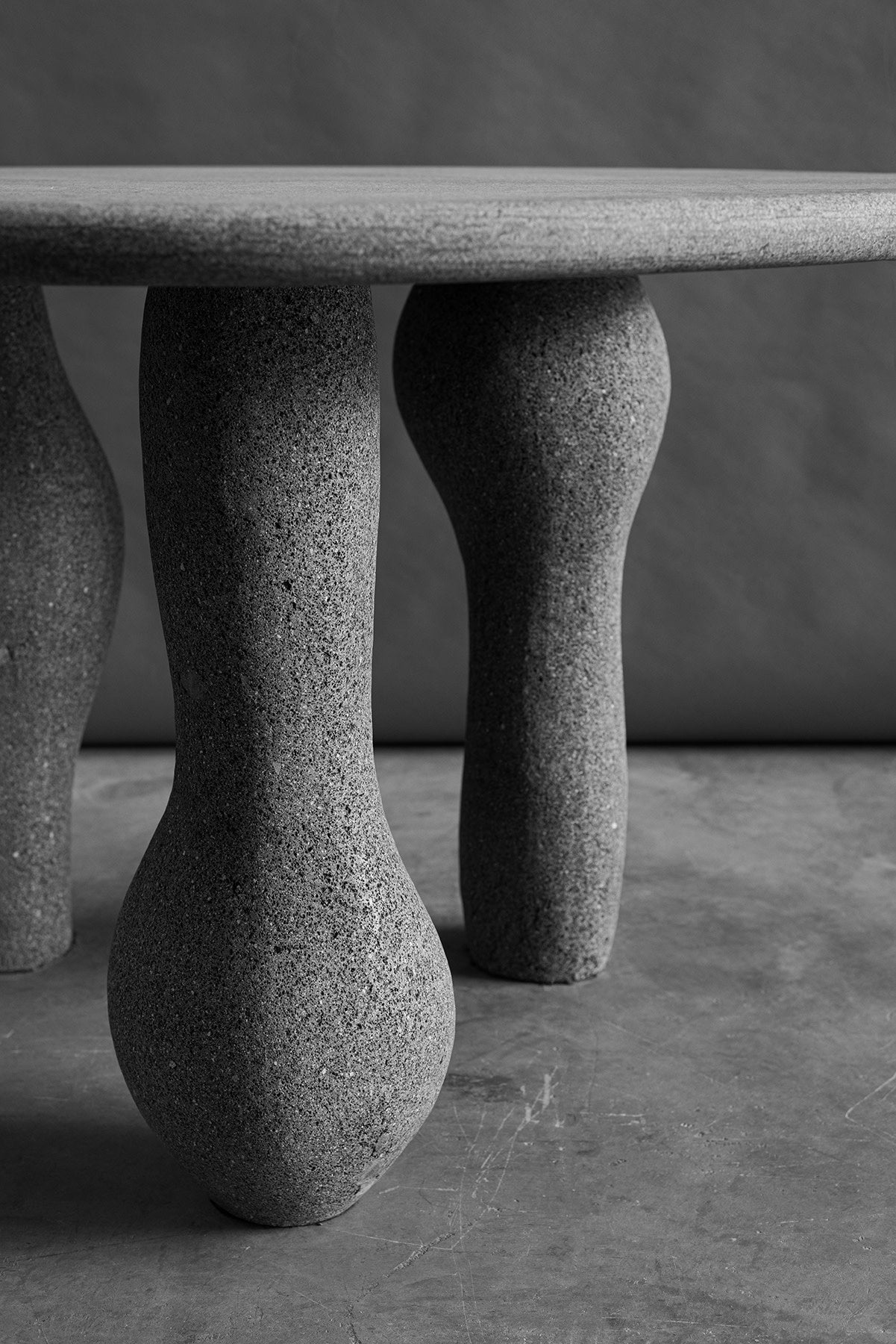 Altar Round Table in Stone — side angle