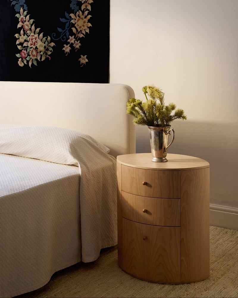 Observer nightstand in natural birch with three drawers and metal pitcher