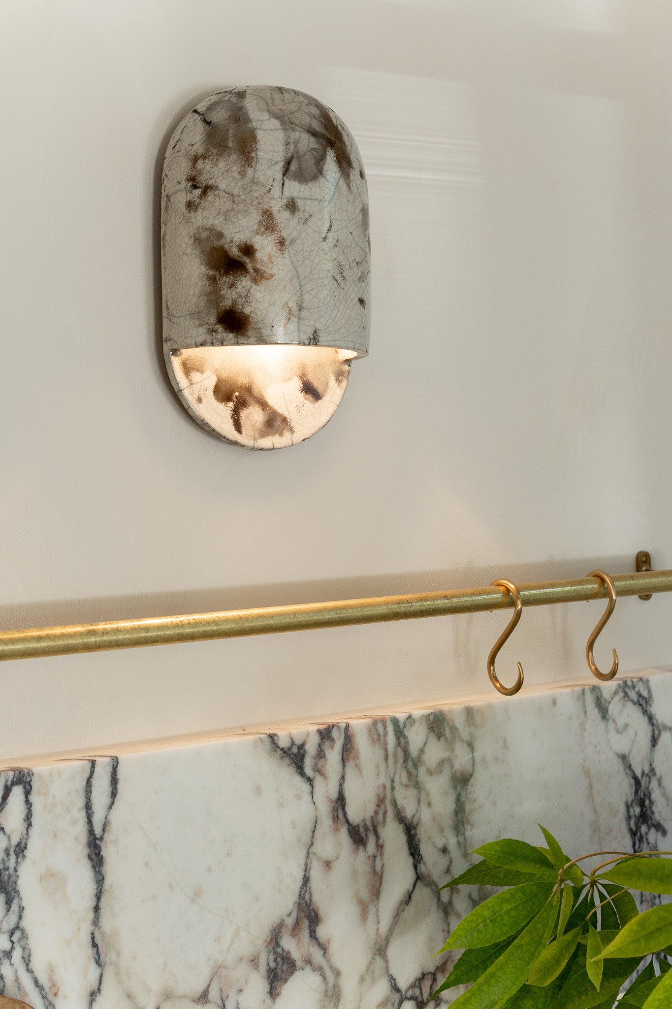 Tera Sconce Raku — lifestyle setting