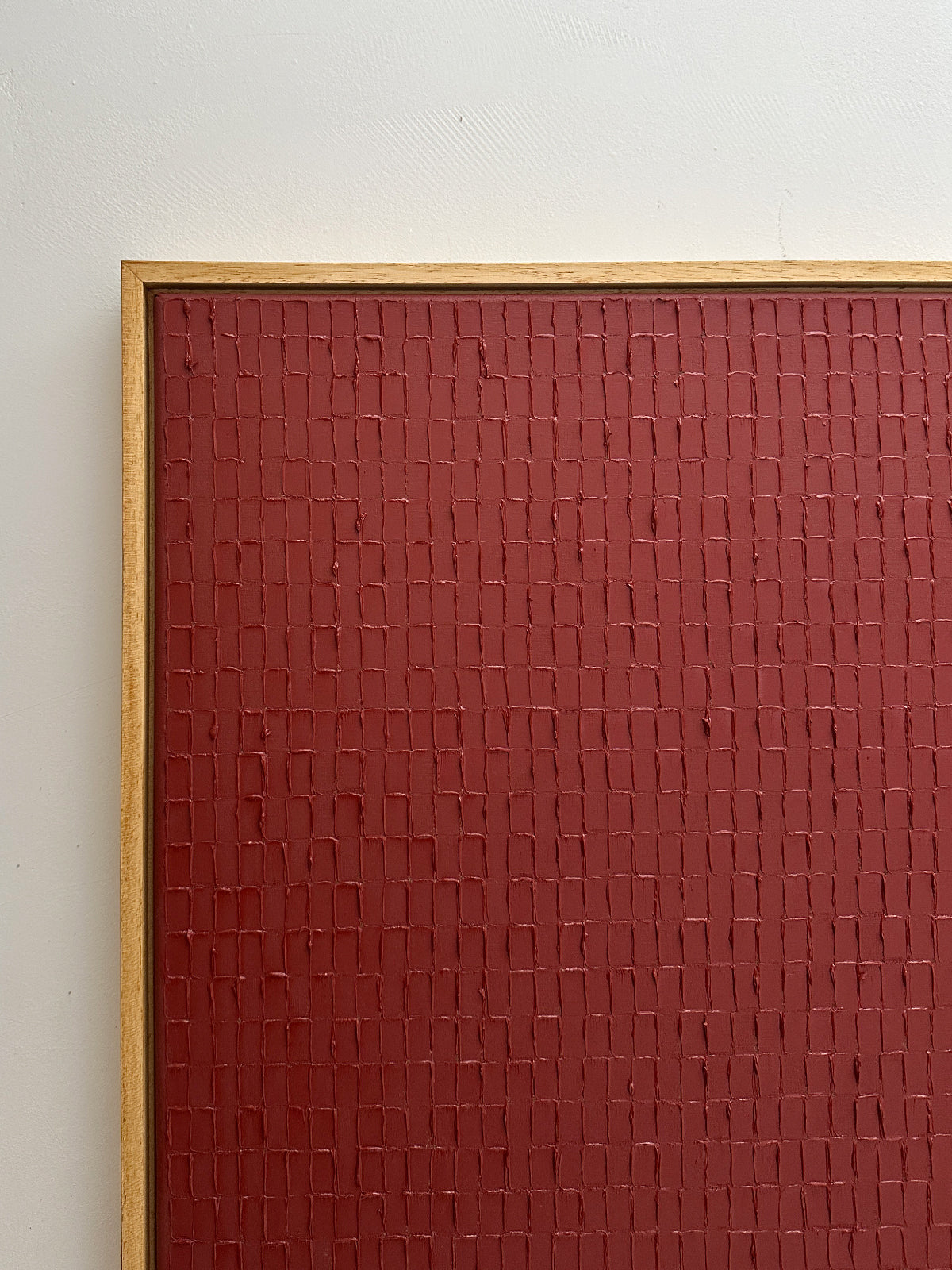 Indian red textured painting detail showing geometric pattern
