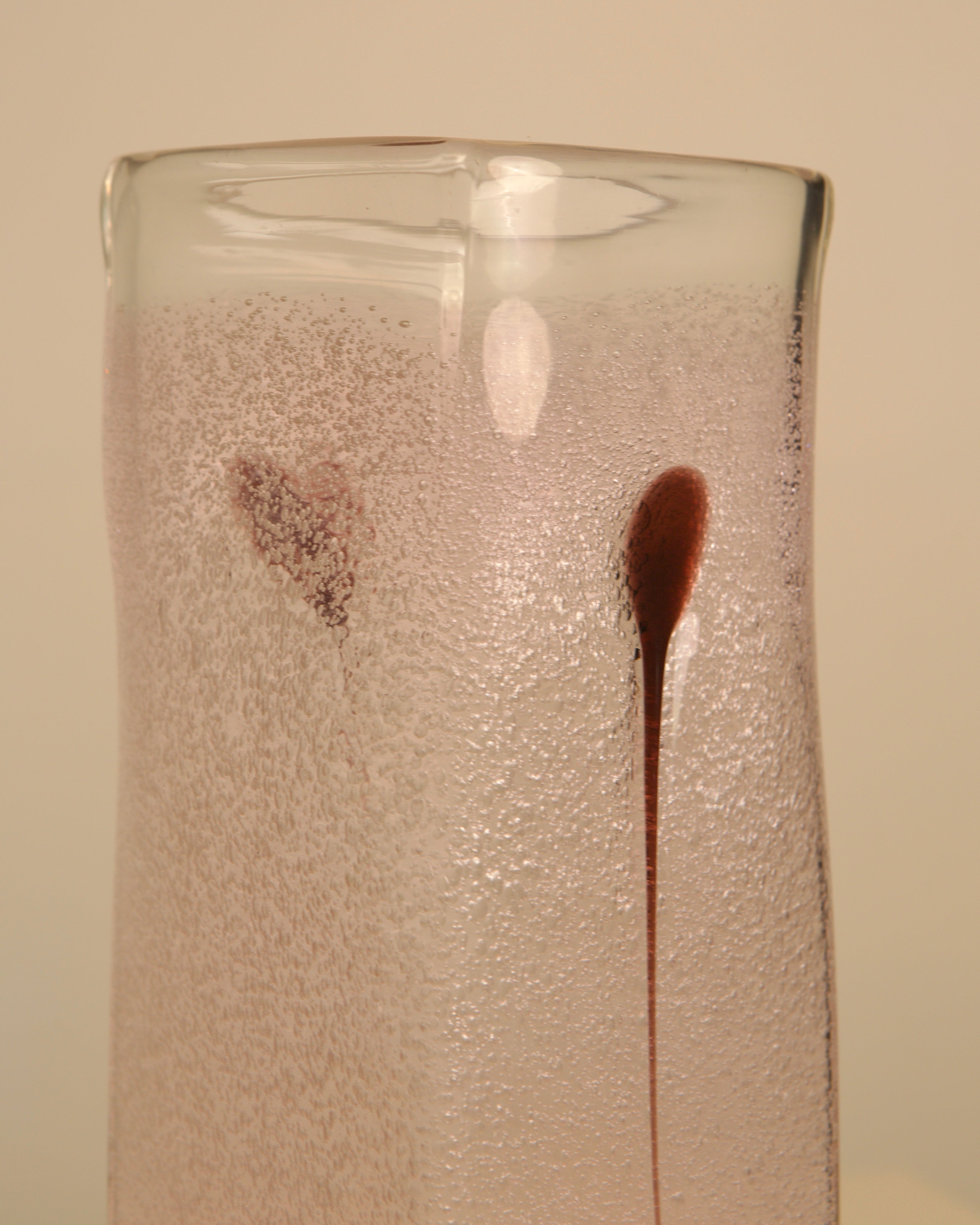 80s Italian Murano glass vase and purple feather — detail view