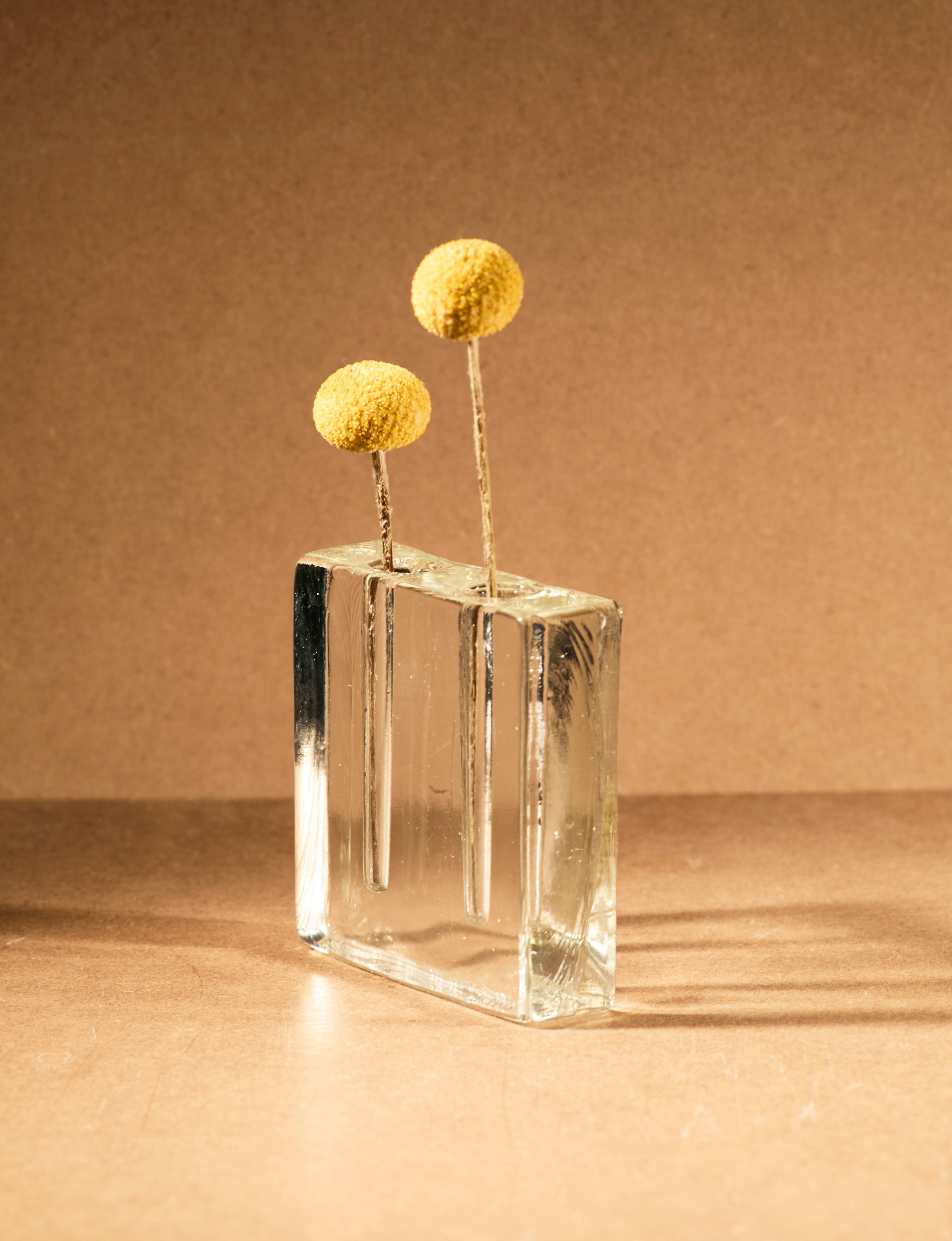 Vintage Scandinavian Clear Vase in Glass c. 1960 — front view with yellow flowers