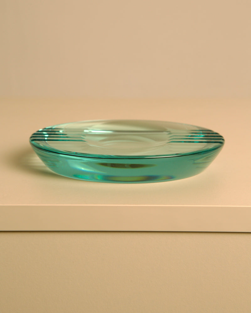 Round Italian Glass Ashtray by Fontana Arte, 1970s — close-up view of turquoise glass surface