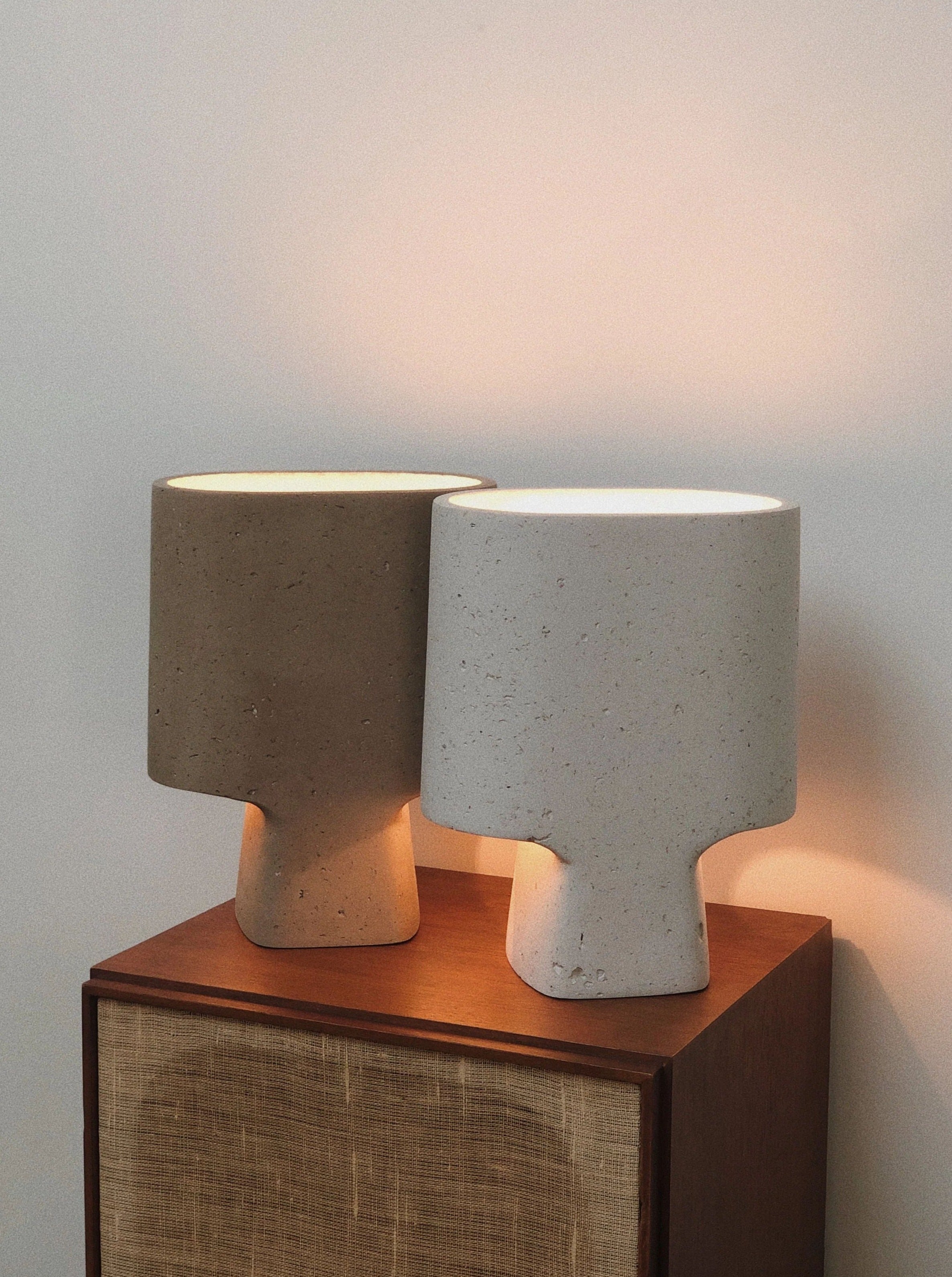 Lamp Bien Faite Taupe — side angle showing taupe ceramic base on wooden surface