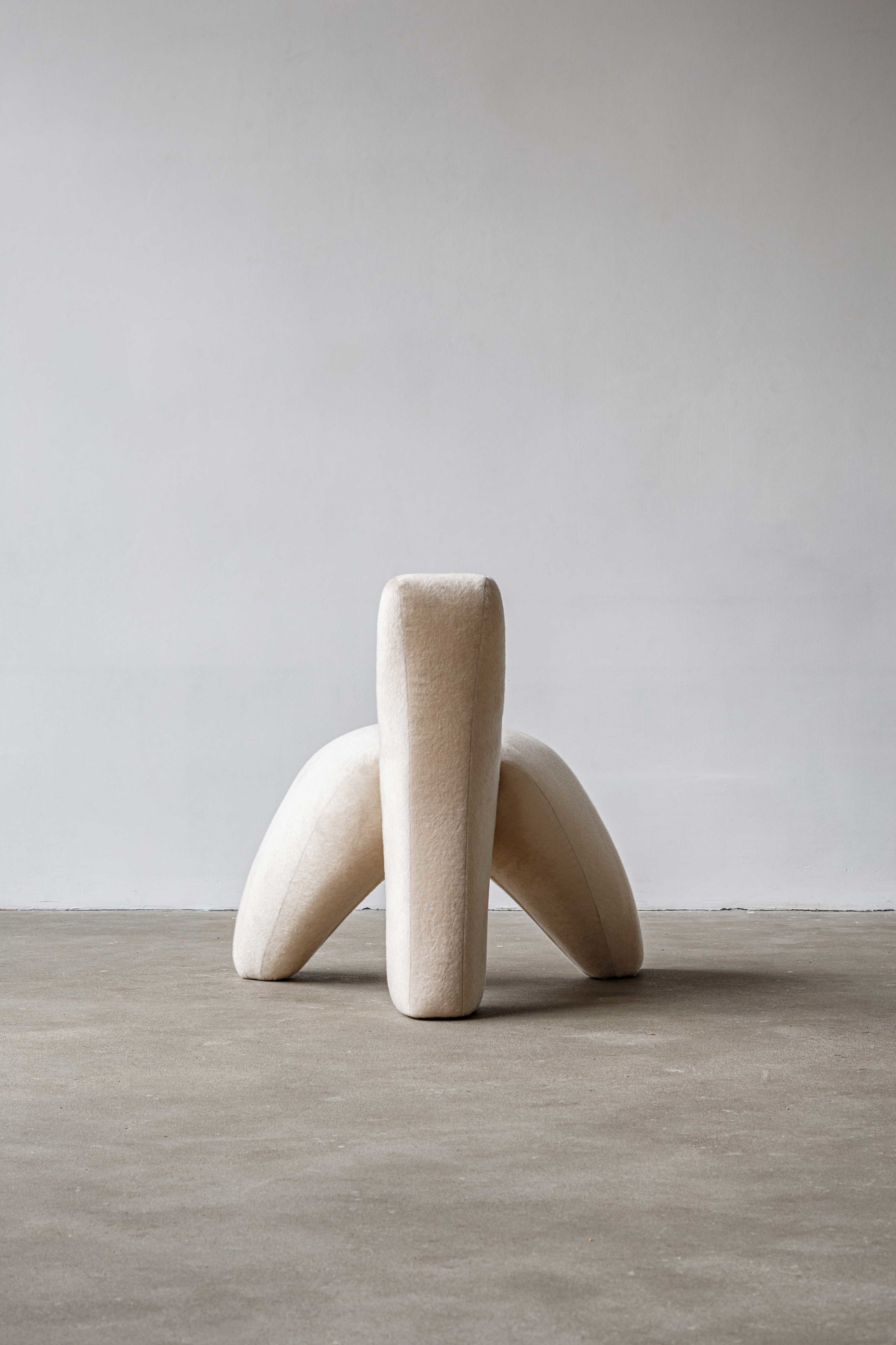 Sokil armchair — top view of upholstered cream seat