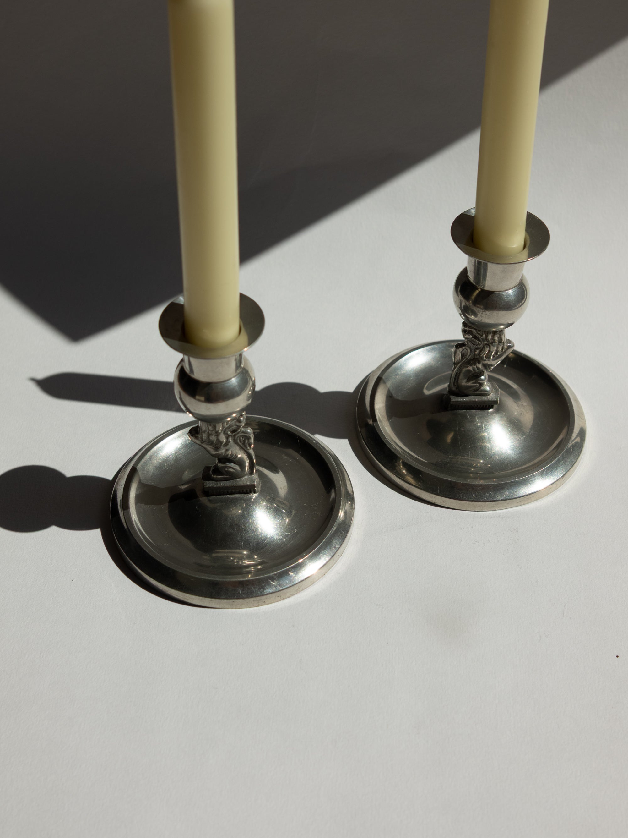 Pair of Swedish Grace Art Deco Pewter Lion Candlesticks by Eskilstuna Metallindustri, 1932 — in context