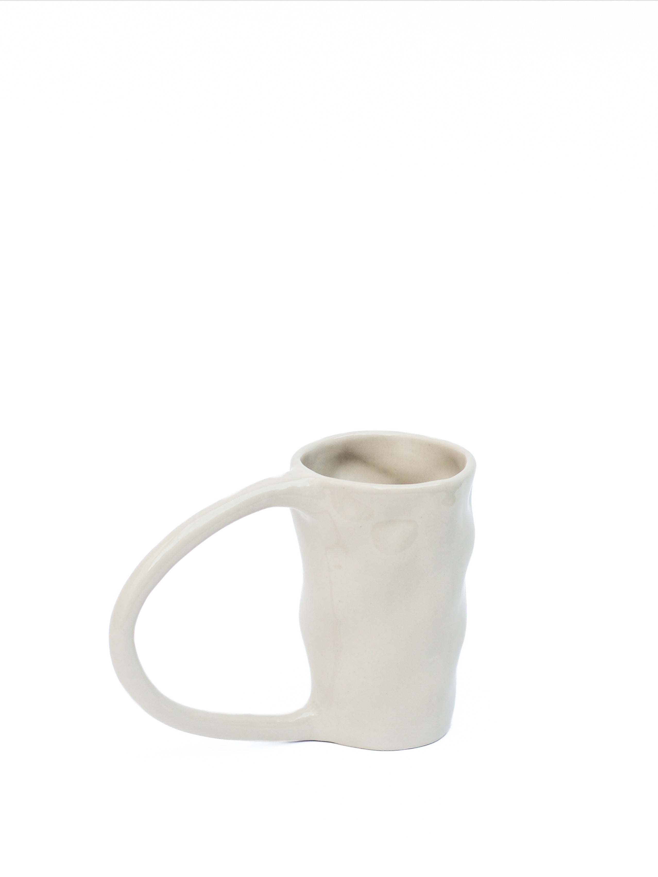 Large Stoneware Coffee Mug — side angle showing smooth, off-white surface