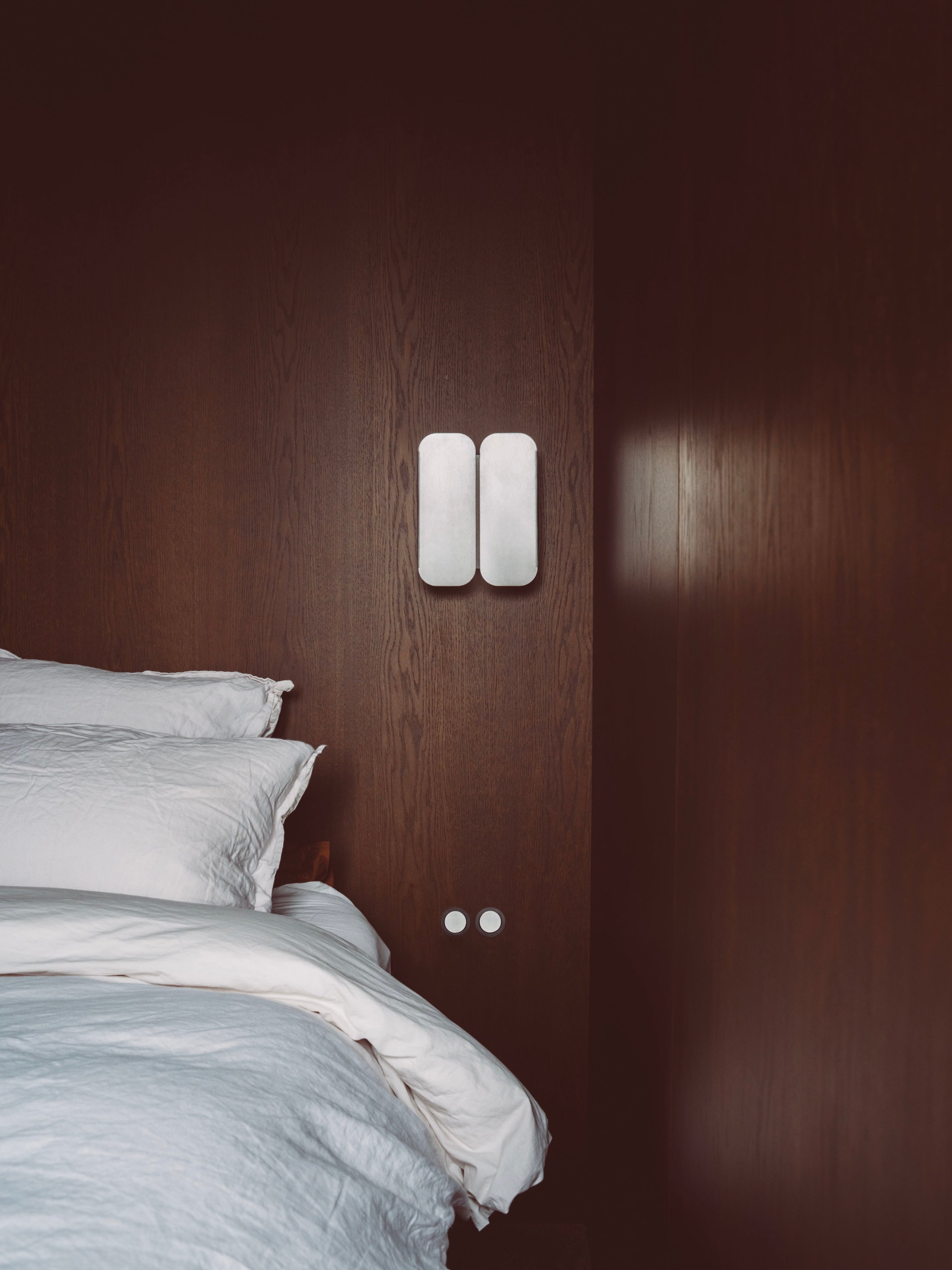 Wall Lamp - 1.0 - Double -Stainless Steel — side view mounted on dark wood wall