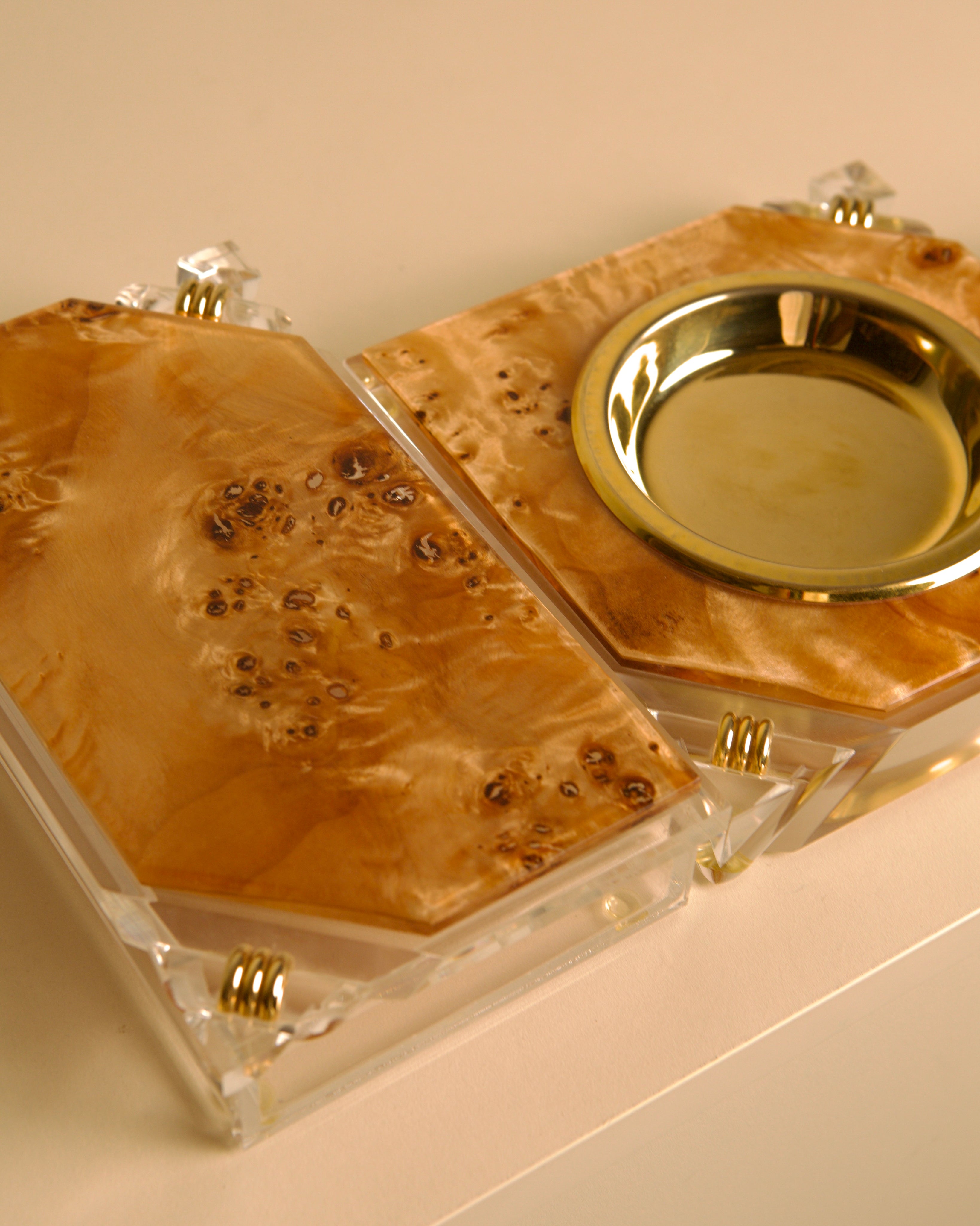 Italian 70s desk set for smokers in wood, plexiglass, and brass — lifestyle setting