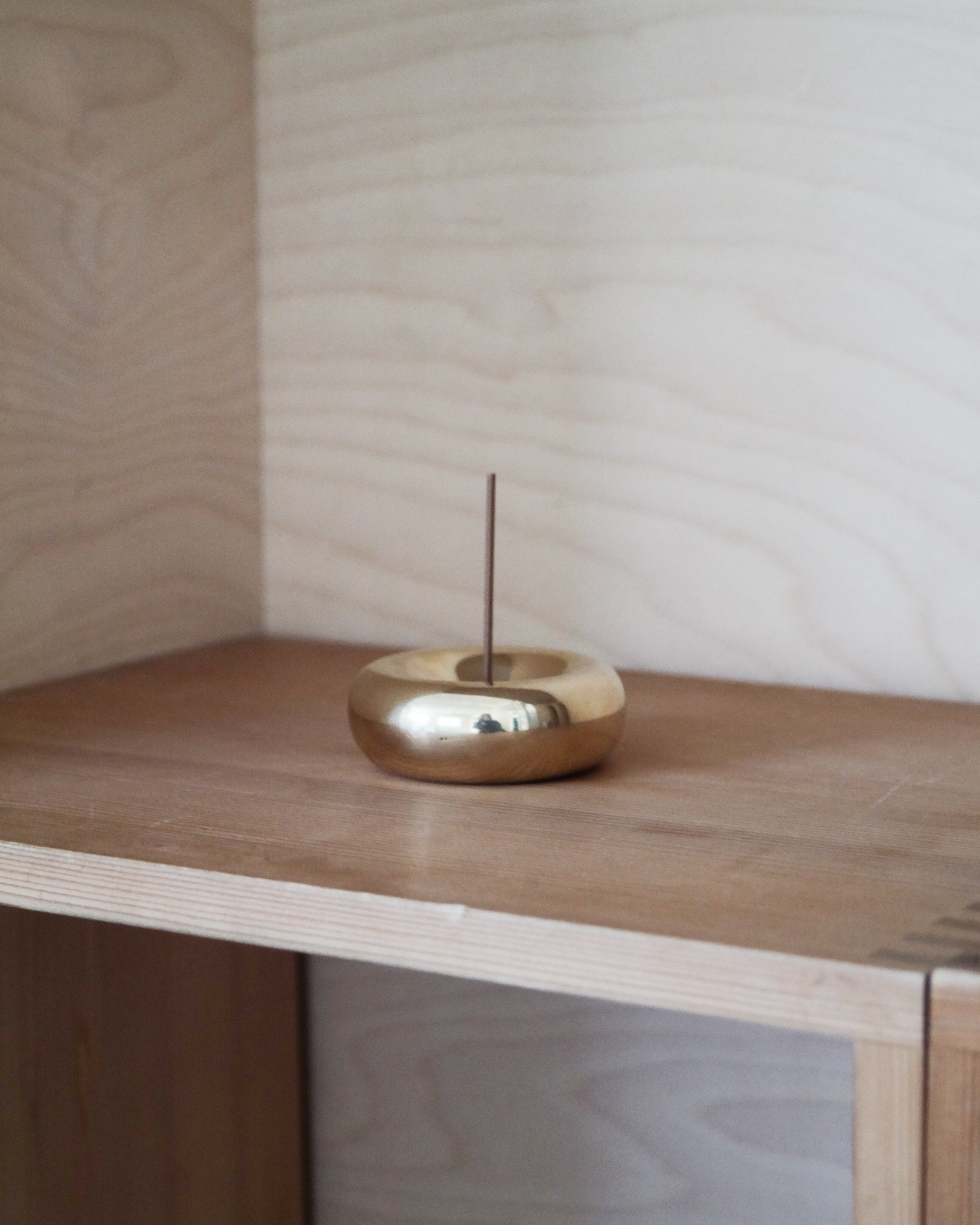 BASIN Incense Holder — back view on wooden shelf