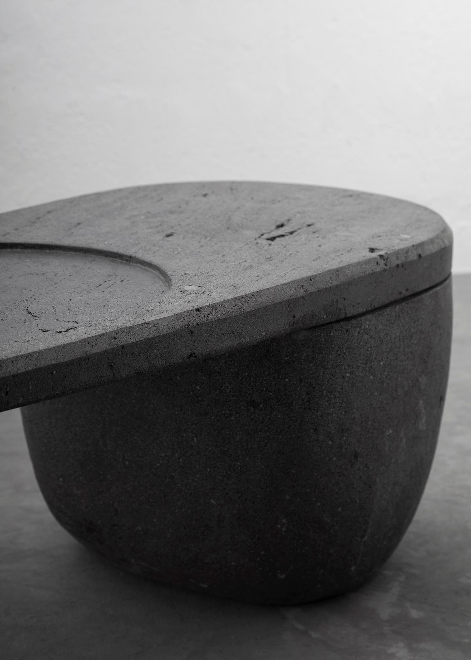CENTRO Coffee Table Handcarved Volcanic Stone — lifestyle setting