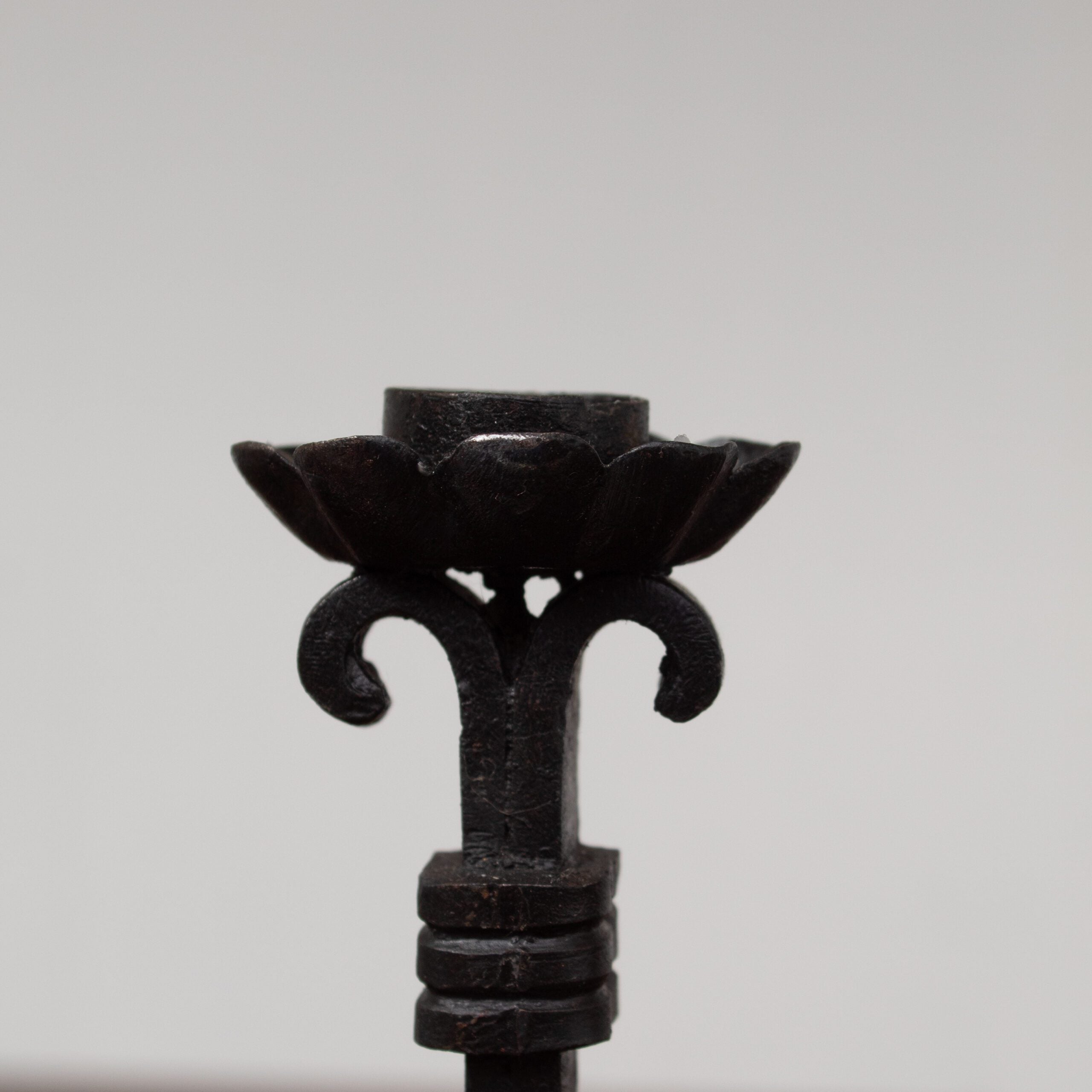 Pair of Brutalist Iron Candleholders with Sculptural Scroll Arms — alternate view