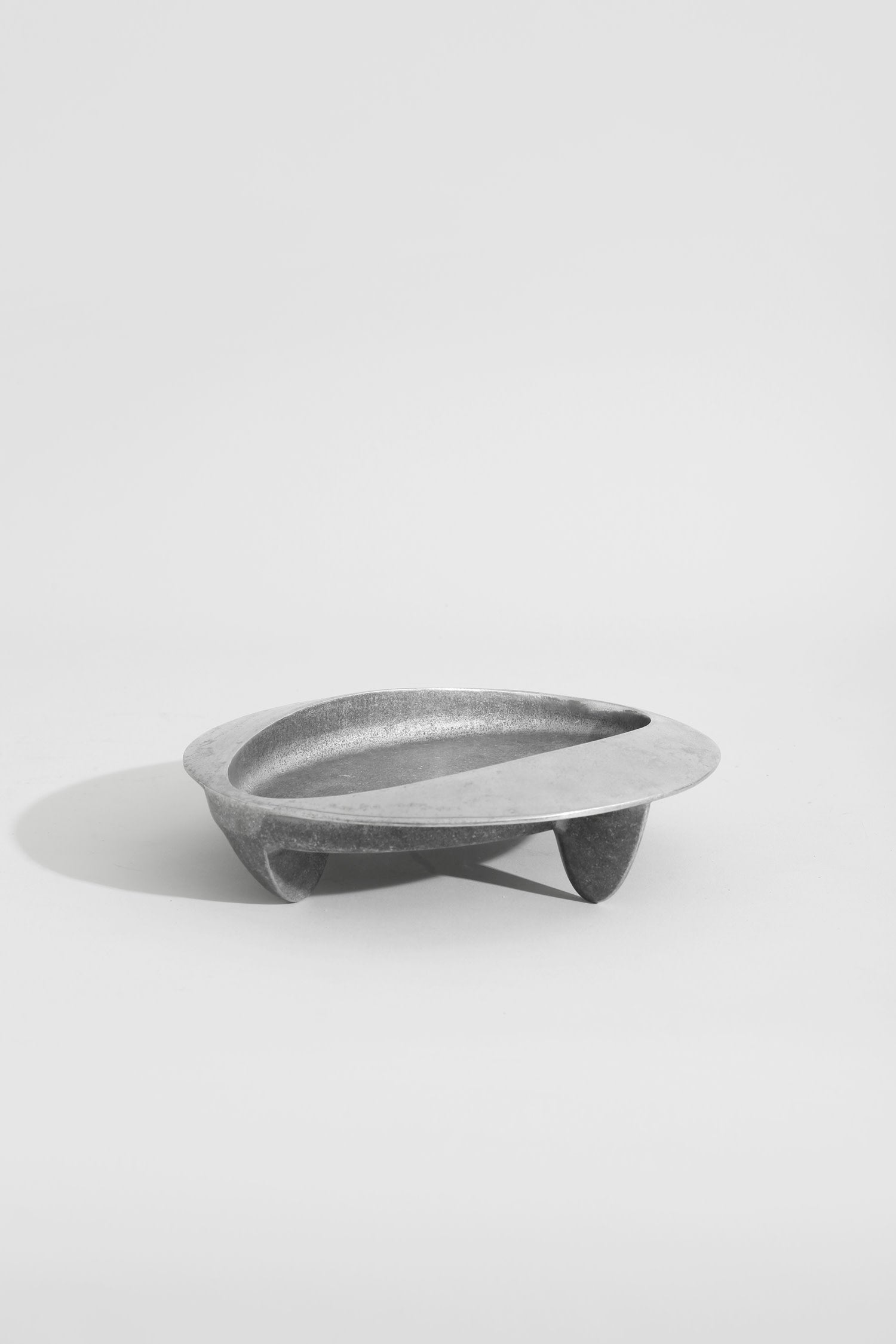 Brutalist Chrome Catchall — angled view on white background