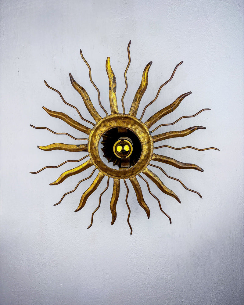 Brutalist Sunburst Ceiling Light – Gilt Iron Rays & Exposed Bulb, France, 1960s by Malamar Studio | The Oblist