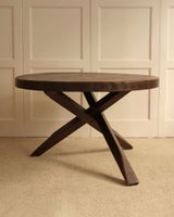 Circular wooden table — close-up