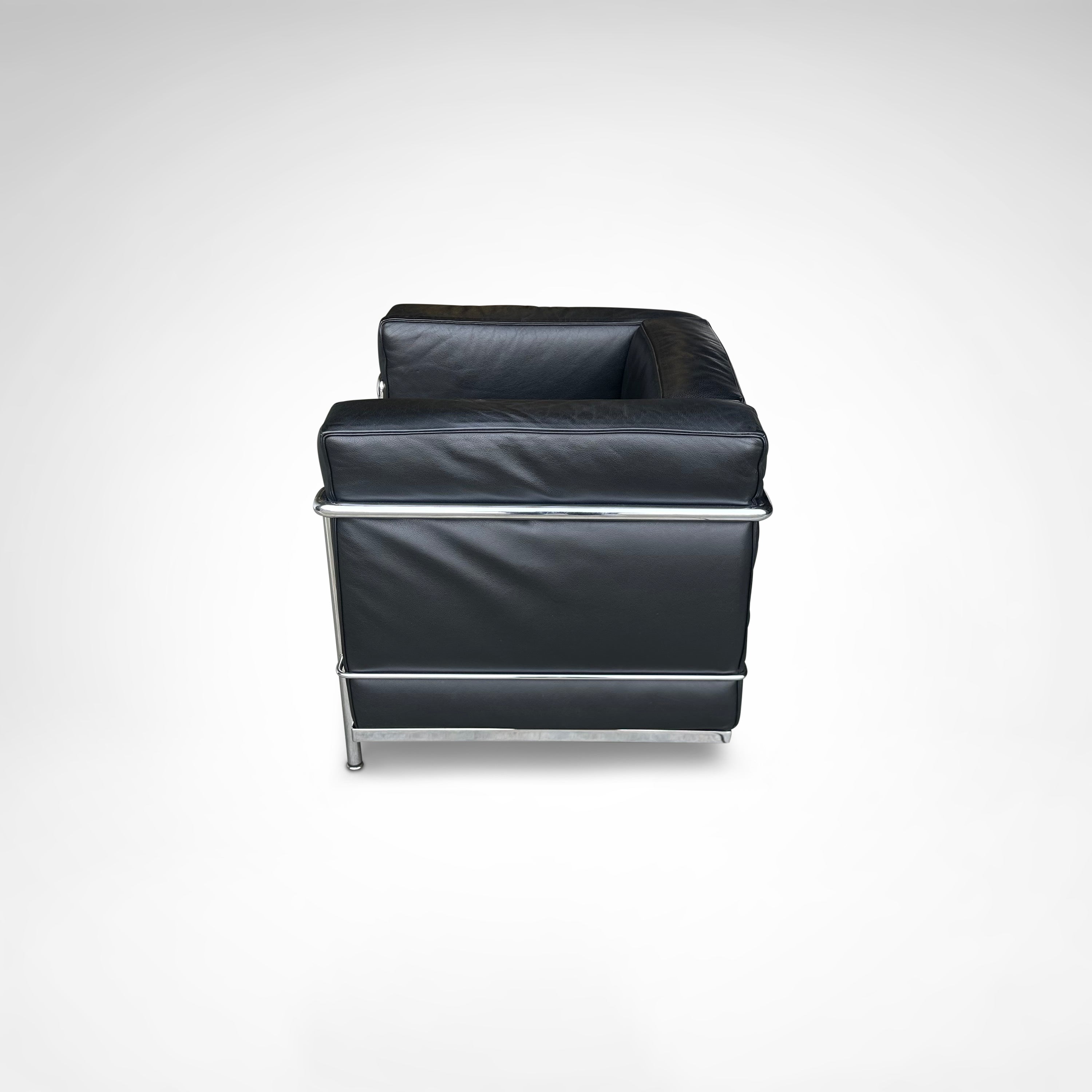 LC2 Armchair and Ottoman by Le Corbusier et al. for Cassina 1990s — rear view highlighting black leather upholstery