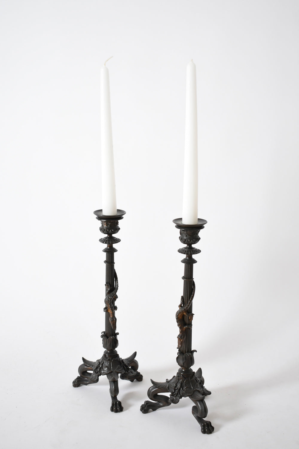 Set of four tripod zoomorphic bronze candleholders, XIXth c. — detail view