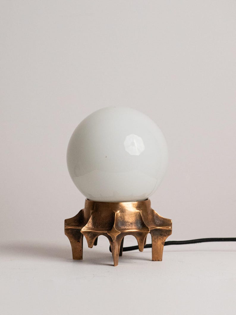 Brutalist Table Lamp, Tripod Cast Metal Base, Opaline Glass Globe Shade, 1970s — lifestyle setting