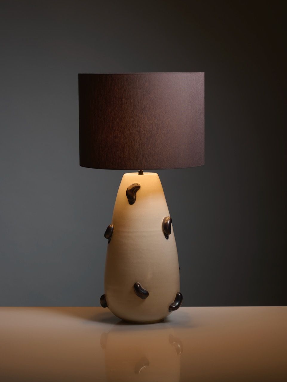 Contemporary Table Lamps in Ceramic - Oceano Collection — close-up of ceramic base with dark accents