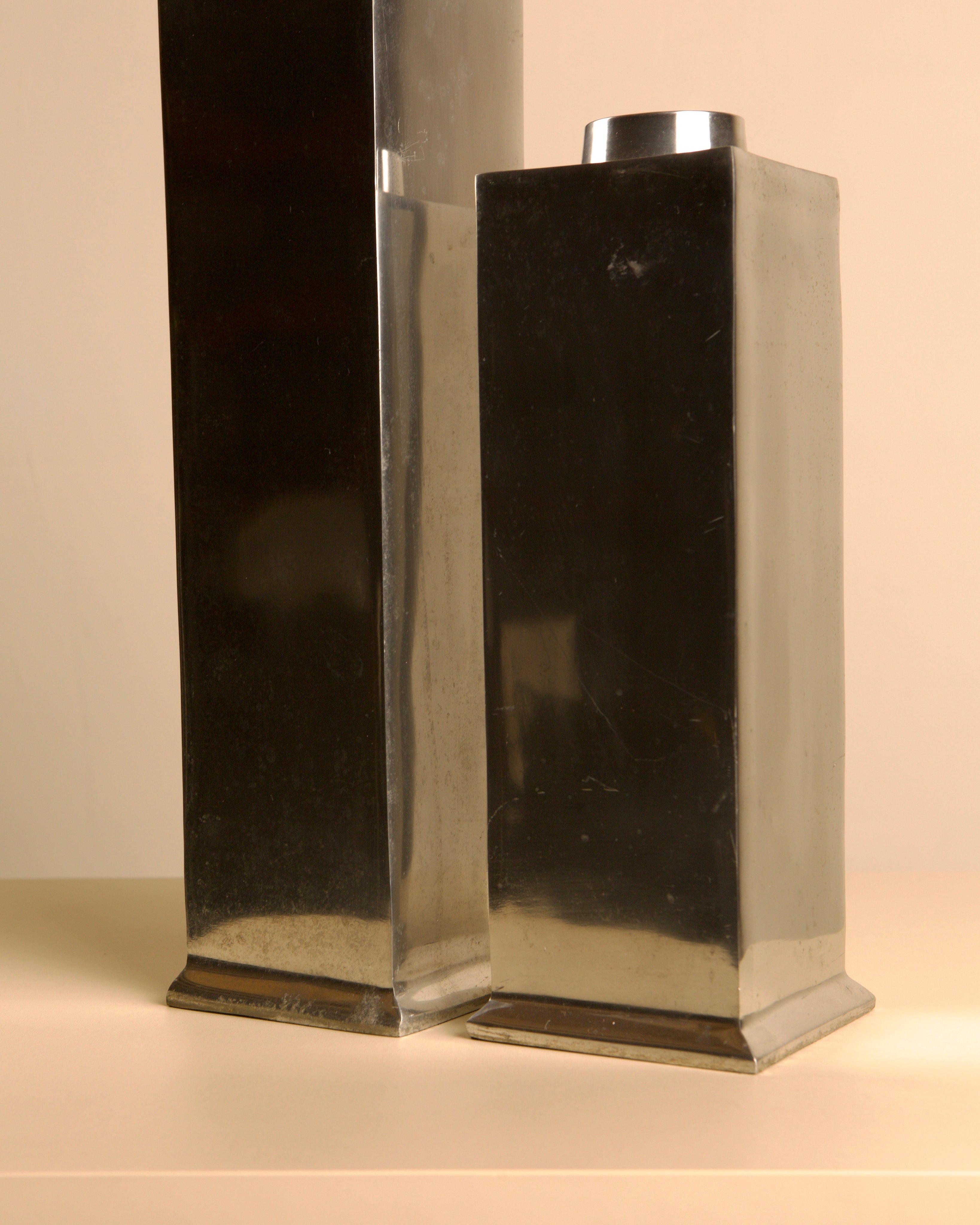 Pair of Italian "Colonne" Cast Aluminum Vases, 1980s — lifestyle setting