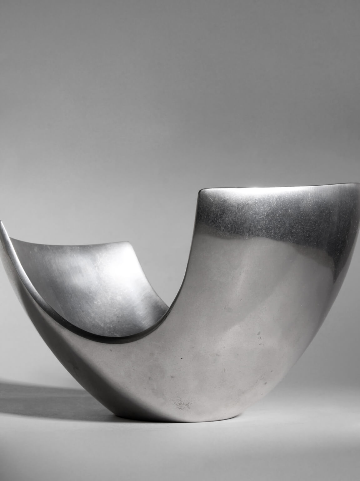 Polished Aluminum Asymmetric Contemporary Deep Bowl, Medium — detail view