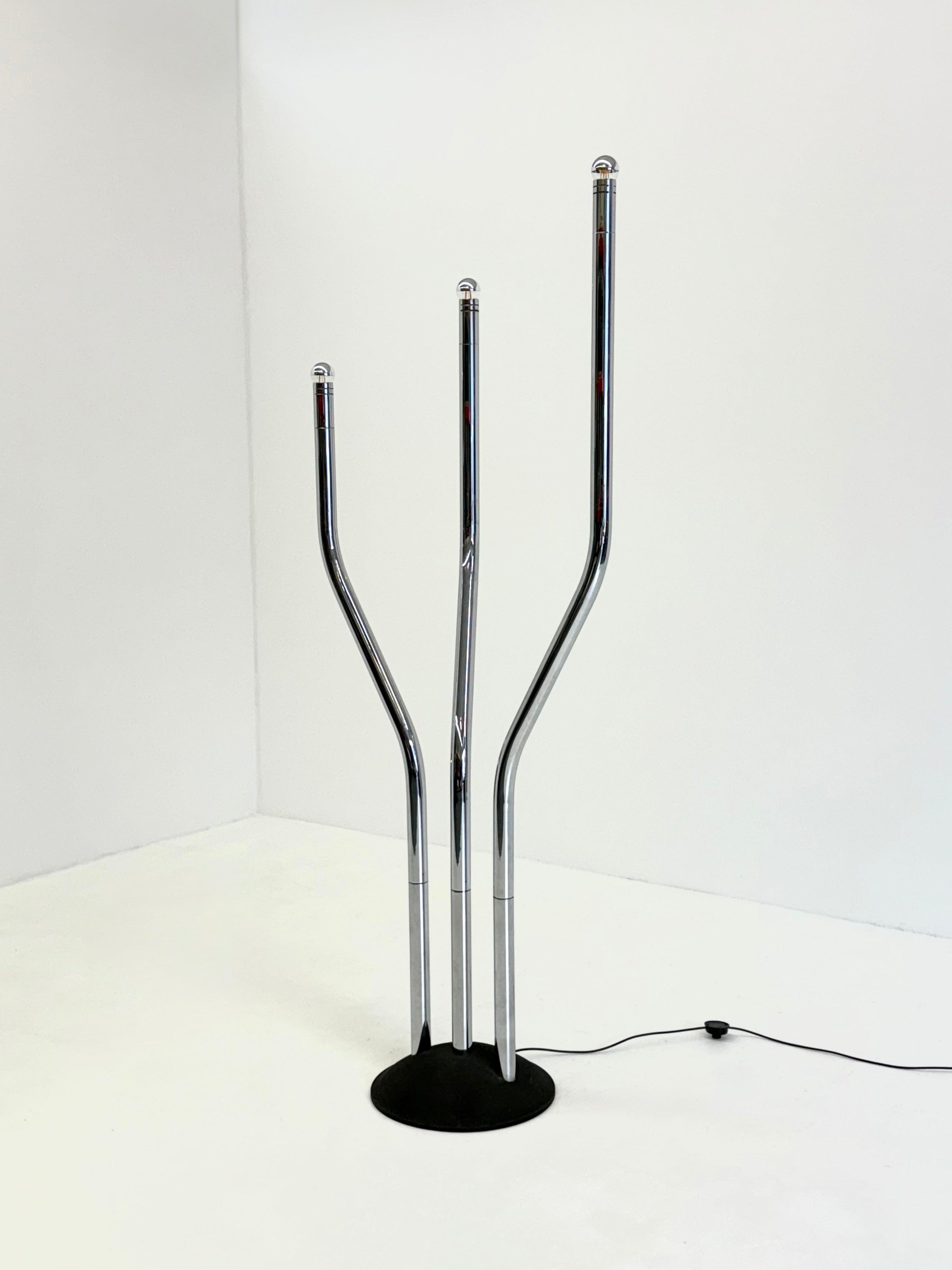 Chrome tubular frame designer floor lamp by Goffredo Reggiani — in context