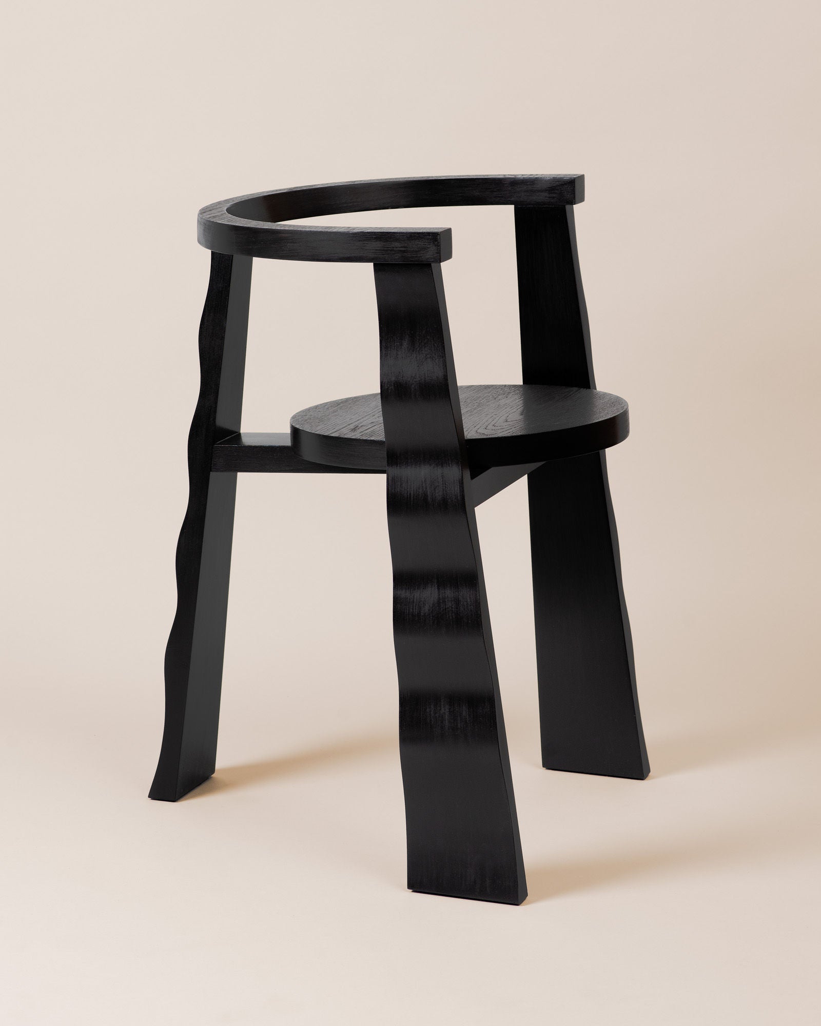 Black oak Puro chair with curved backrest by Elina Ulvio