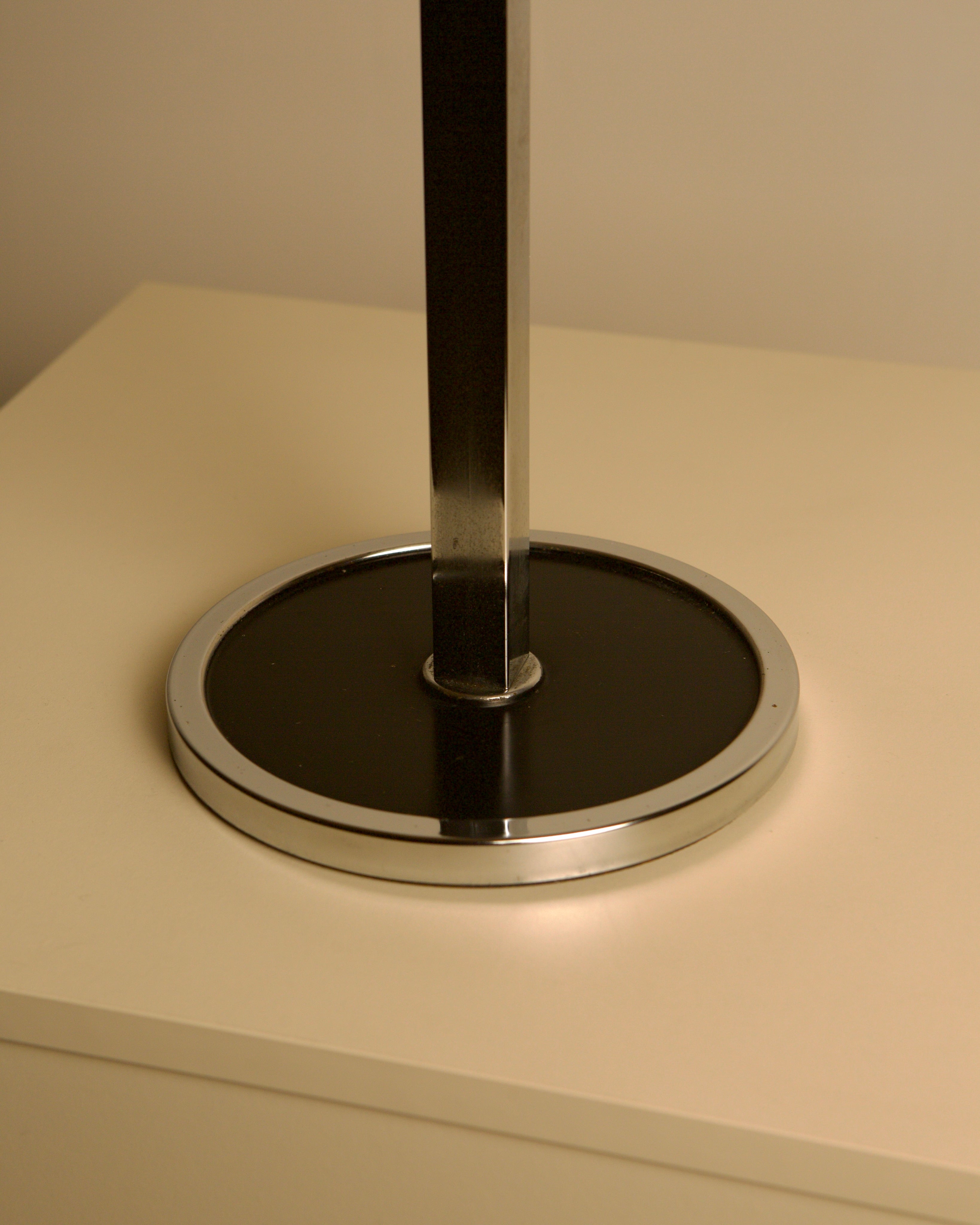 Italian Crystal Ashtray on a Chromed Metal Stand, 1950s — close-up of chromed base on neutral surface