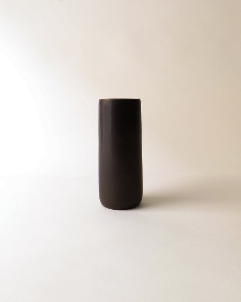 Black cylindrical faience vase from 1950s Sweden