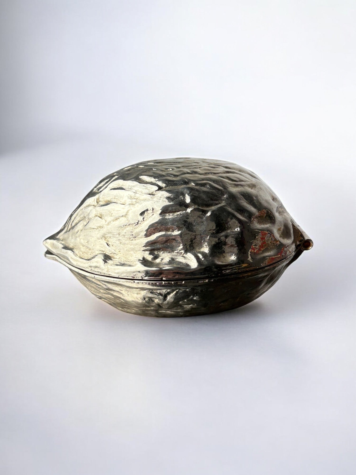 Silver plated Walnut Shaped Nut Cracker, Italy 1970’s — lifestyle setting