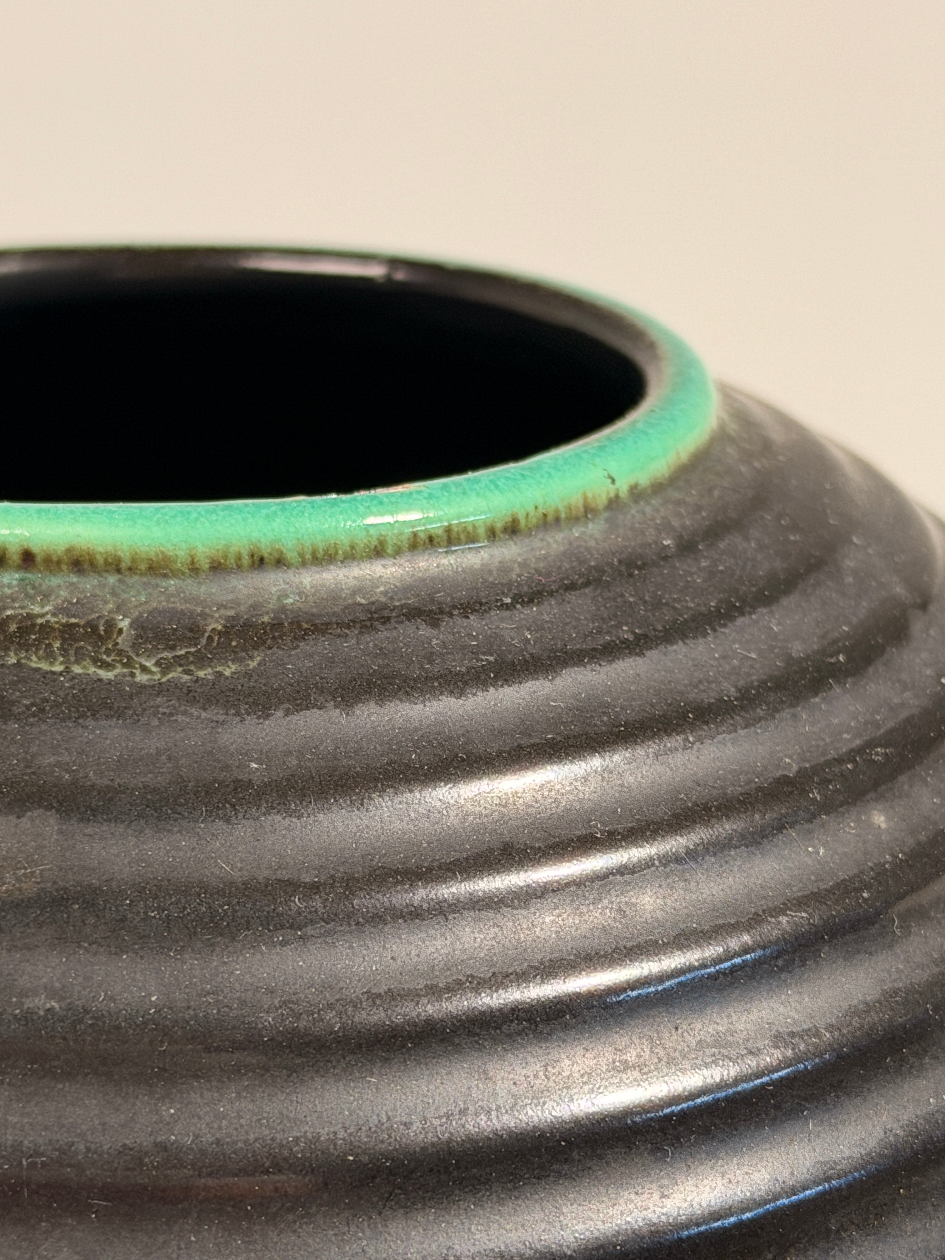 Art Deco ceramic vase, France, circa 1920.  — lifestyle setting