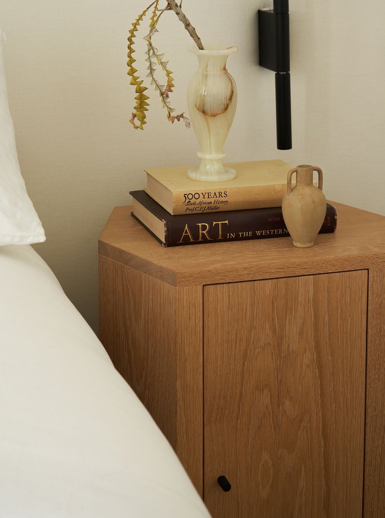 Pair of Park Night Stands in Oiled Oak — corner view with books and vase