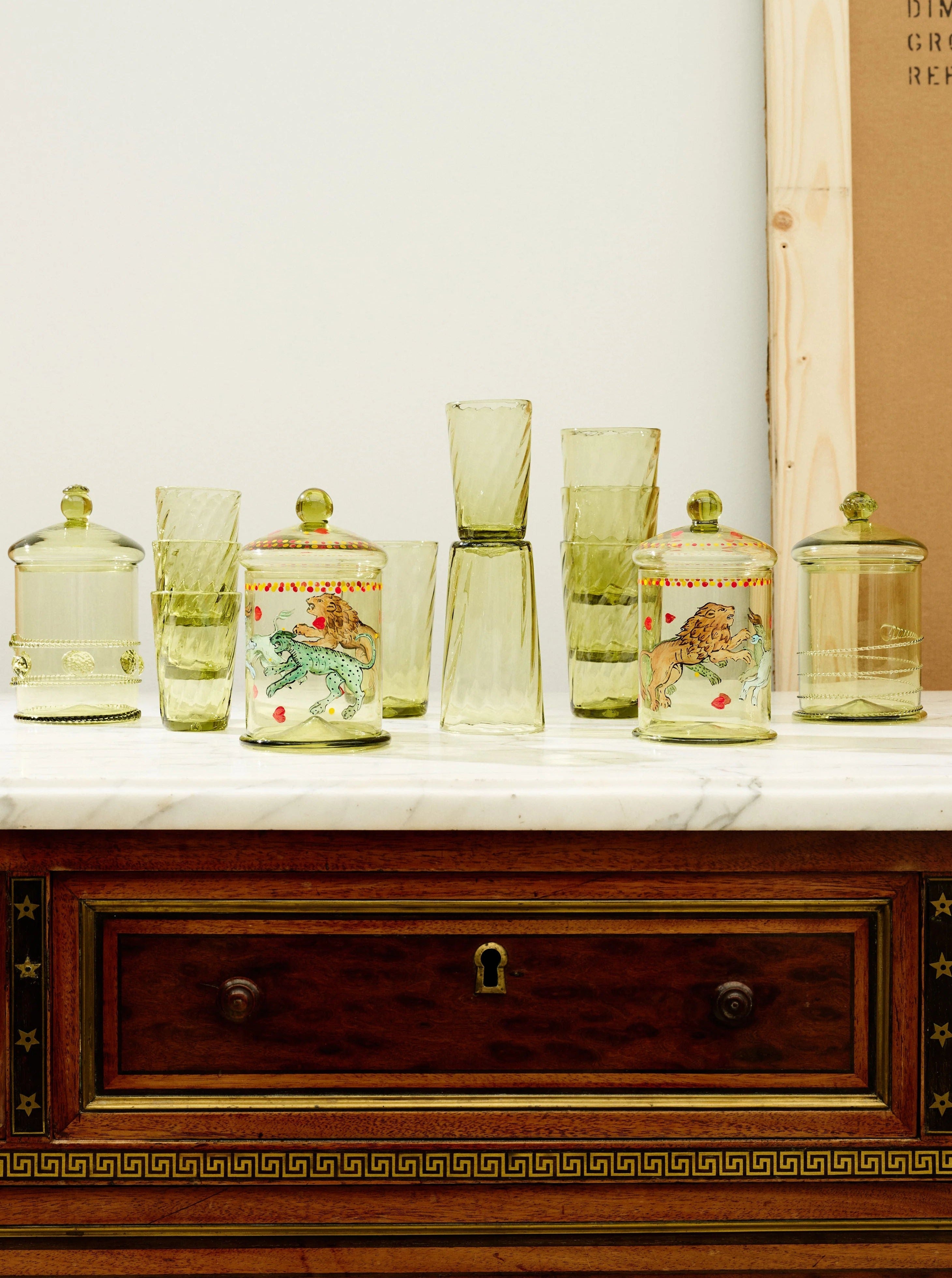 Karl Glass Small - Set of Four — side angle on marble surface with decorative jars