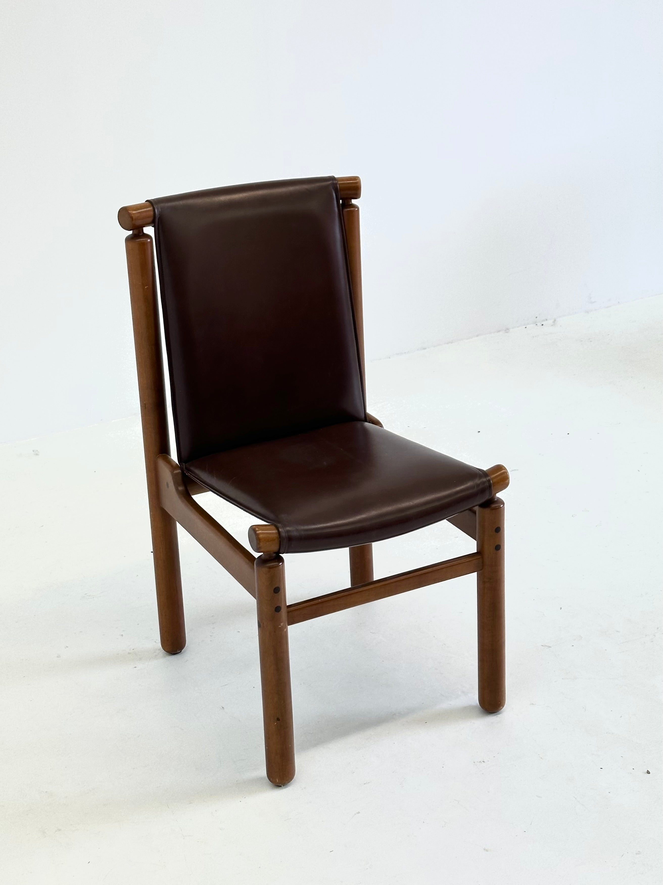 Set of Tapiovaara dining chairs by La Permanente Cantù — lifestyle setting