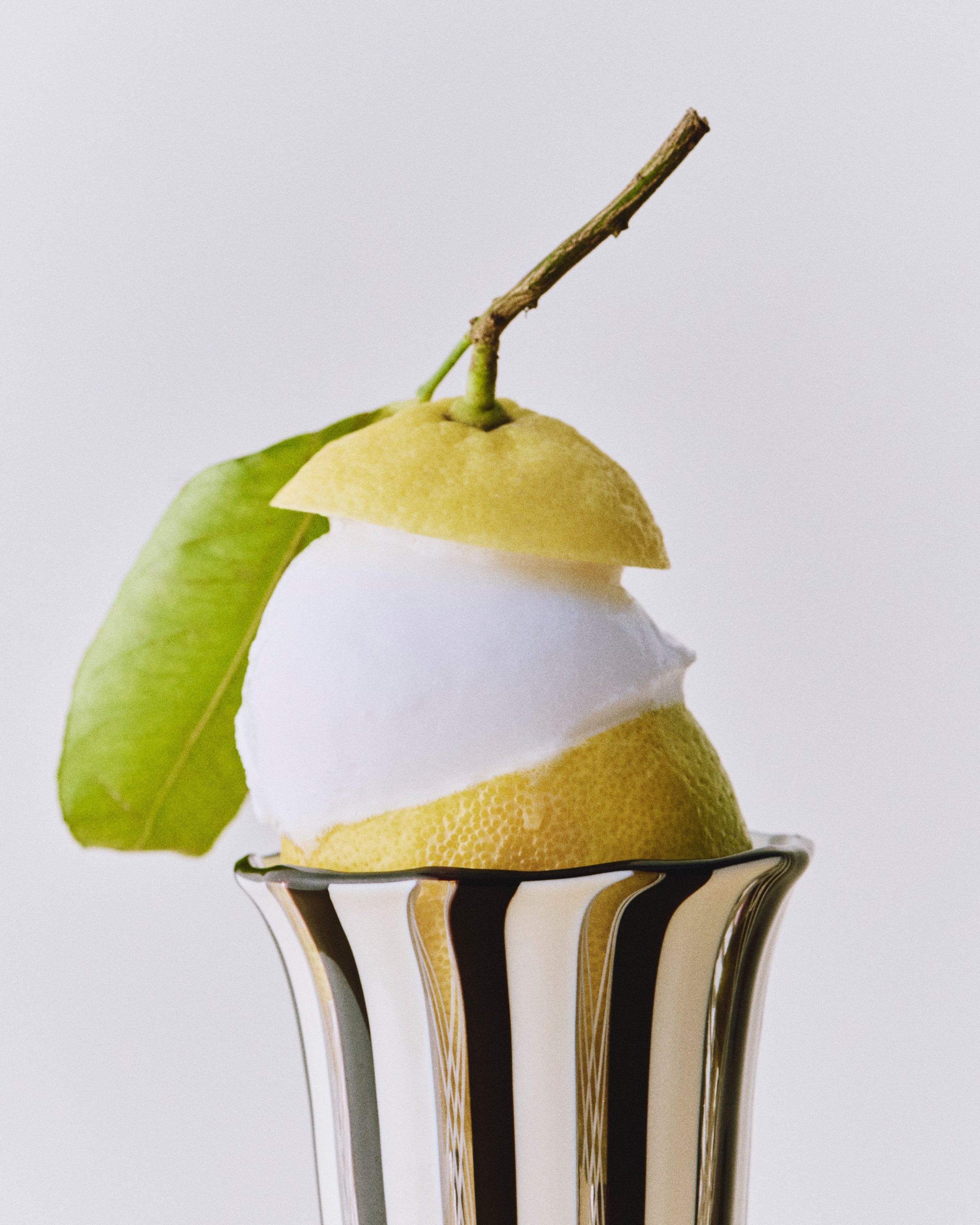 Clara Glasses - Set of four — side angle with lemon sorbet inside