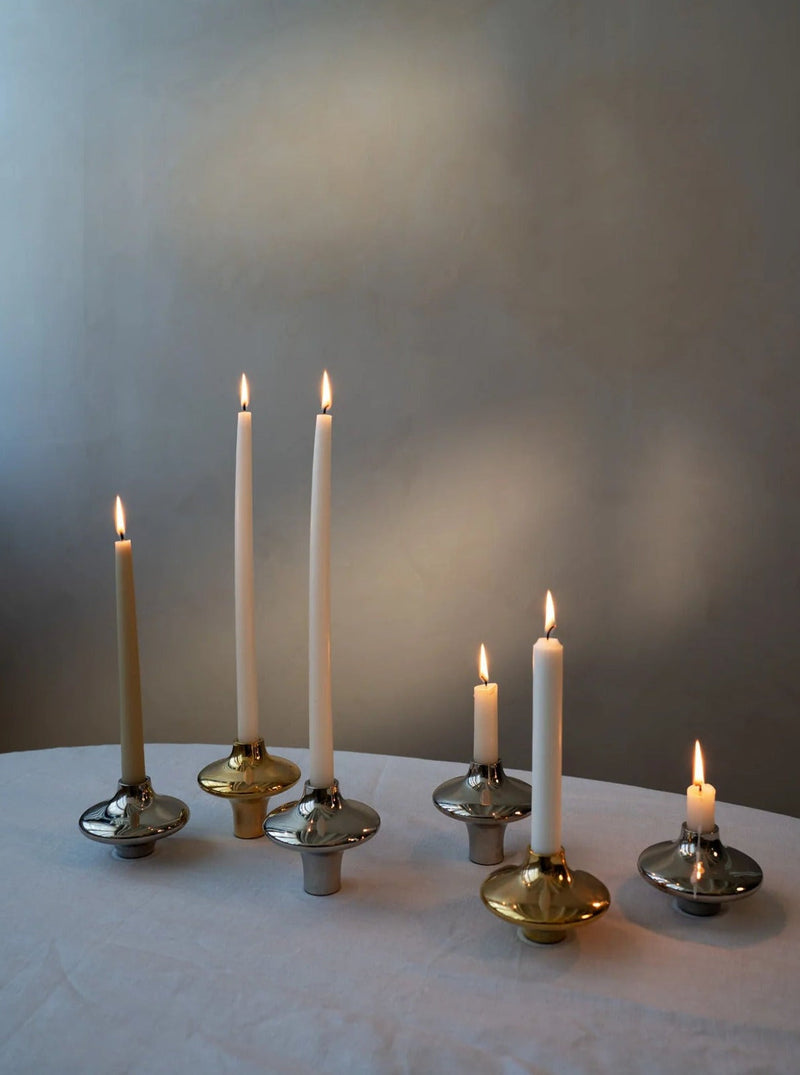 Doublet Candleholder - Small - Silver — close-up of candleholder with lit candles