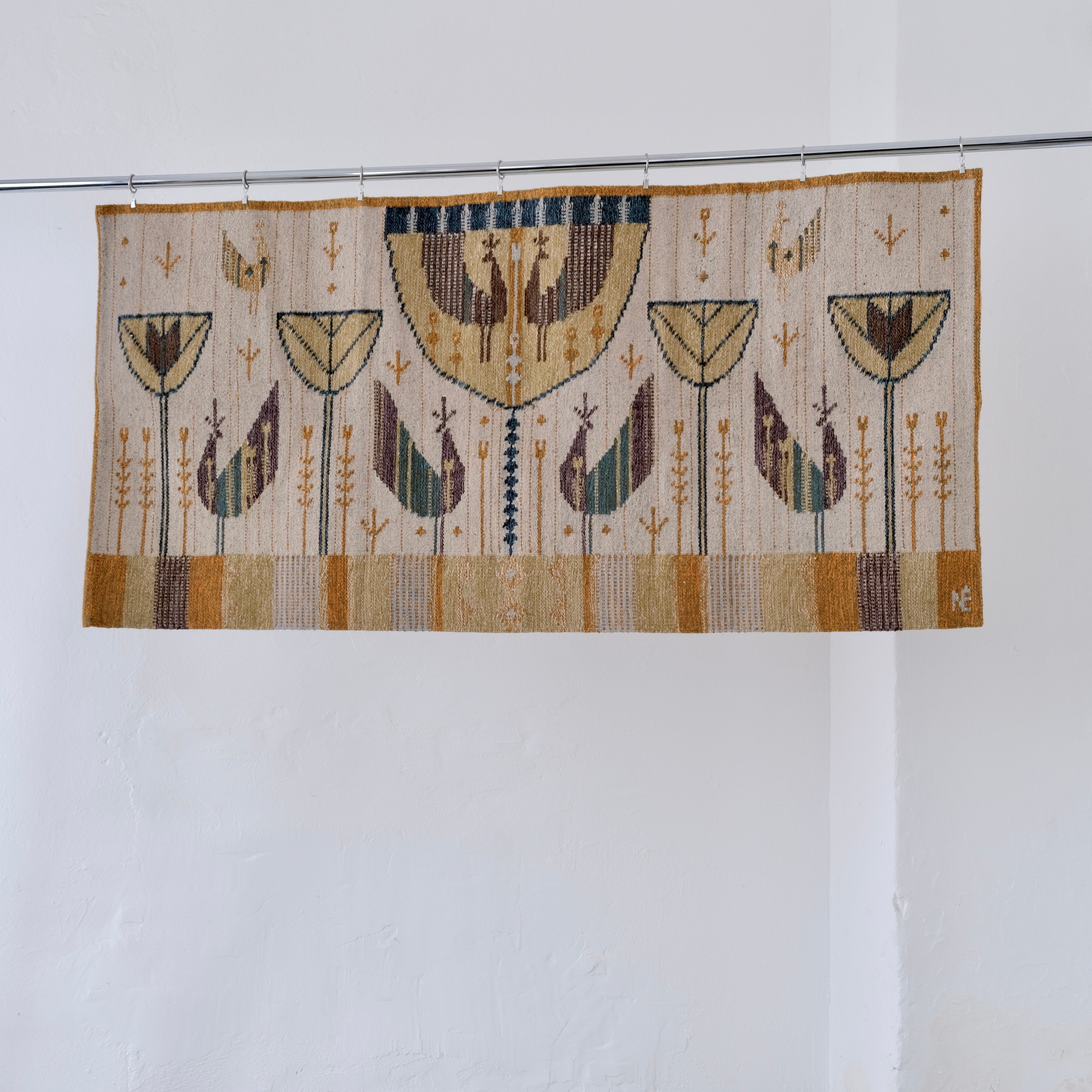 Mid-Century Wool Wall Tapestry by Éva Németh — top view hanging on white wall