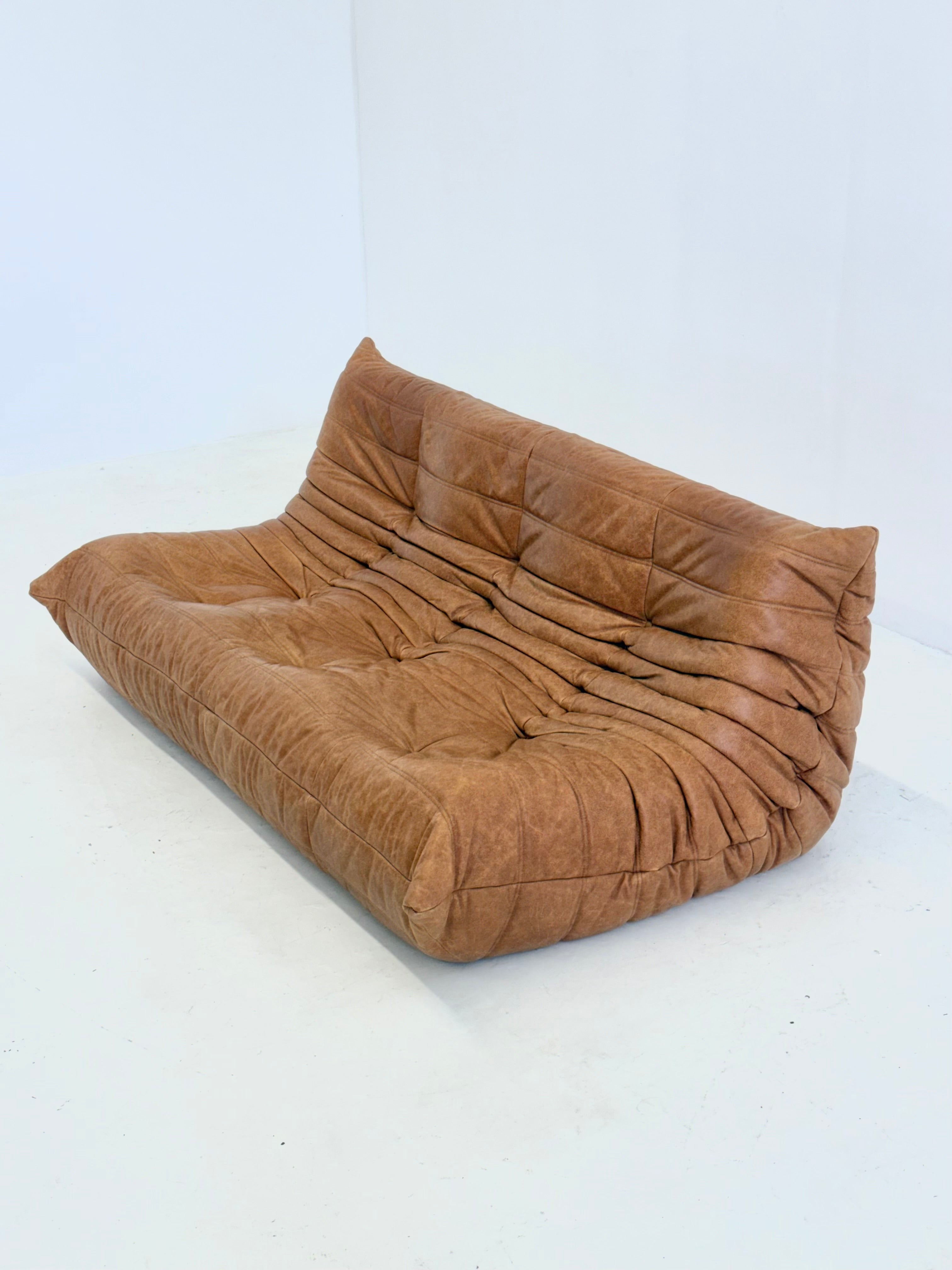 Ligne Roset Togo 3-seater in cognac leather — side angle