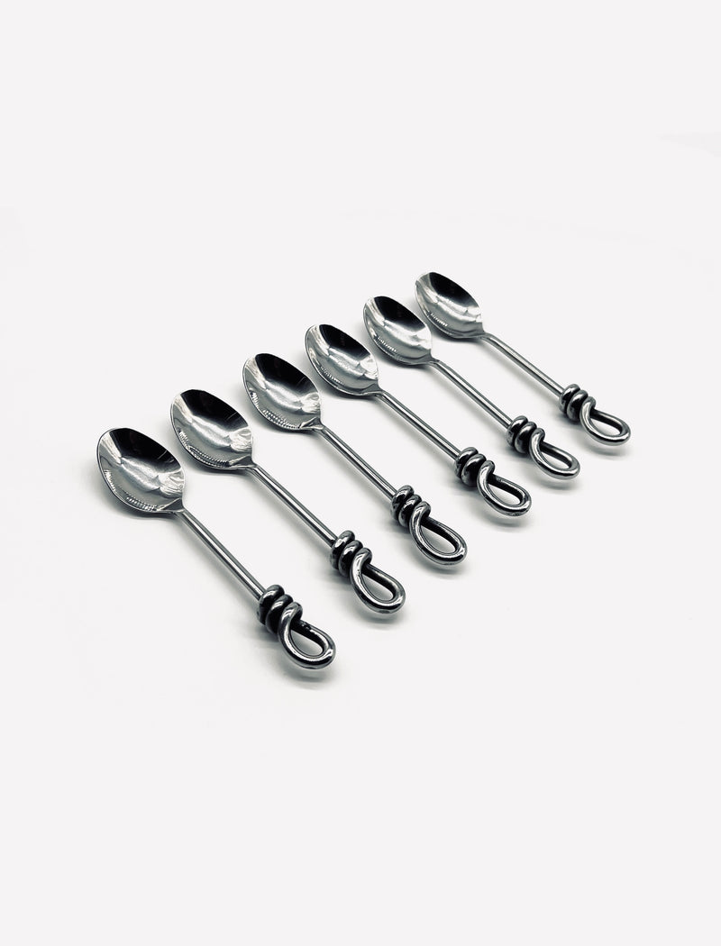 Six vintage stainless steel moka spoons with decorative twisted handles