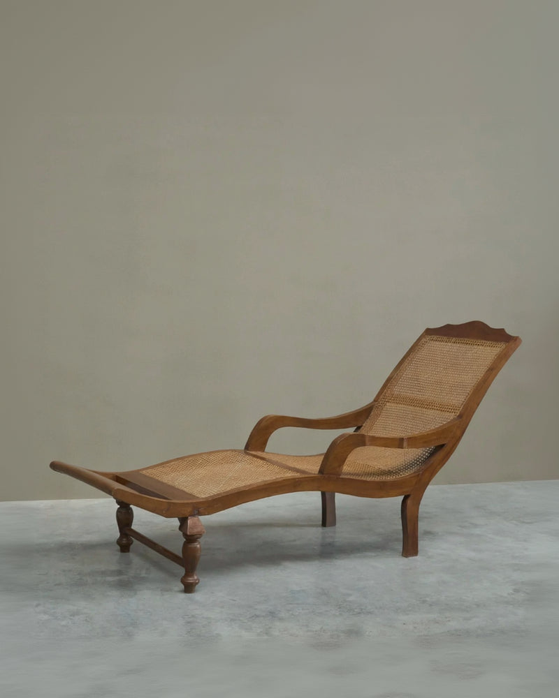 Sculptural Colonial Chaise Longue in Wood and Hand-Woven Cane, 1920s by ORNAMENTUM | The Oblist