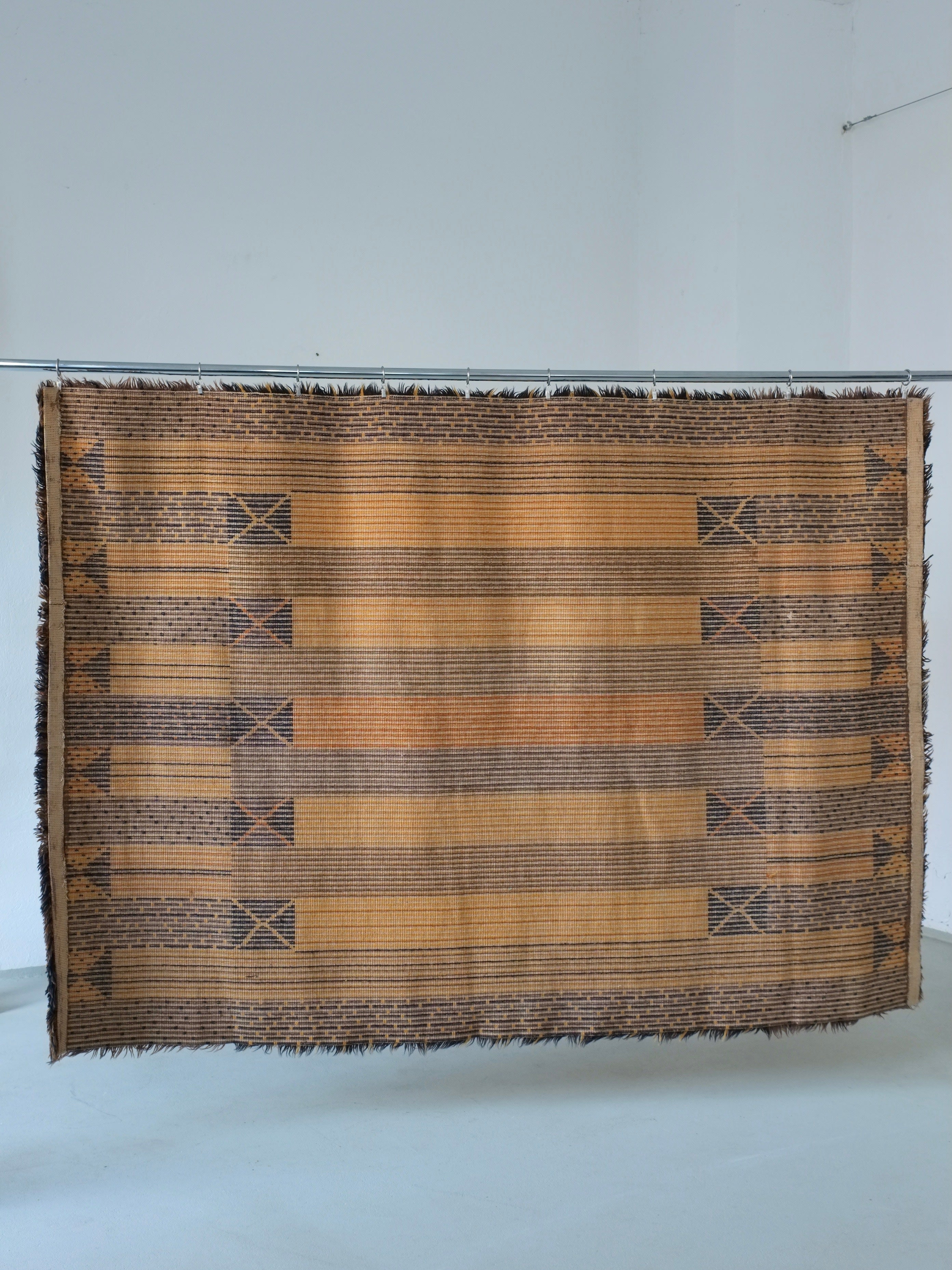 Large Scandinavian Brown Wool Rya Rug | Sweden | 1960s — hung on wall in minimalist setting