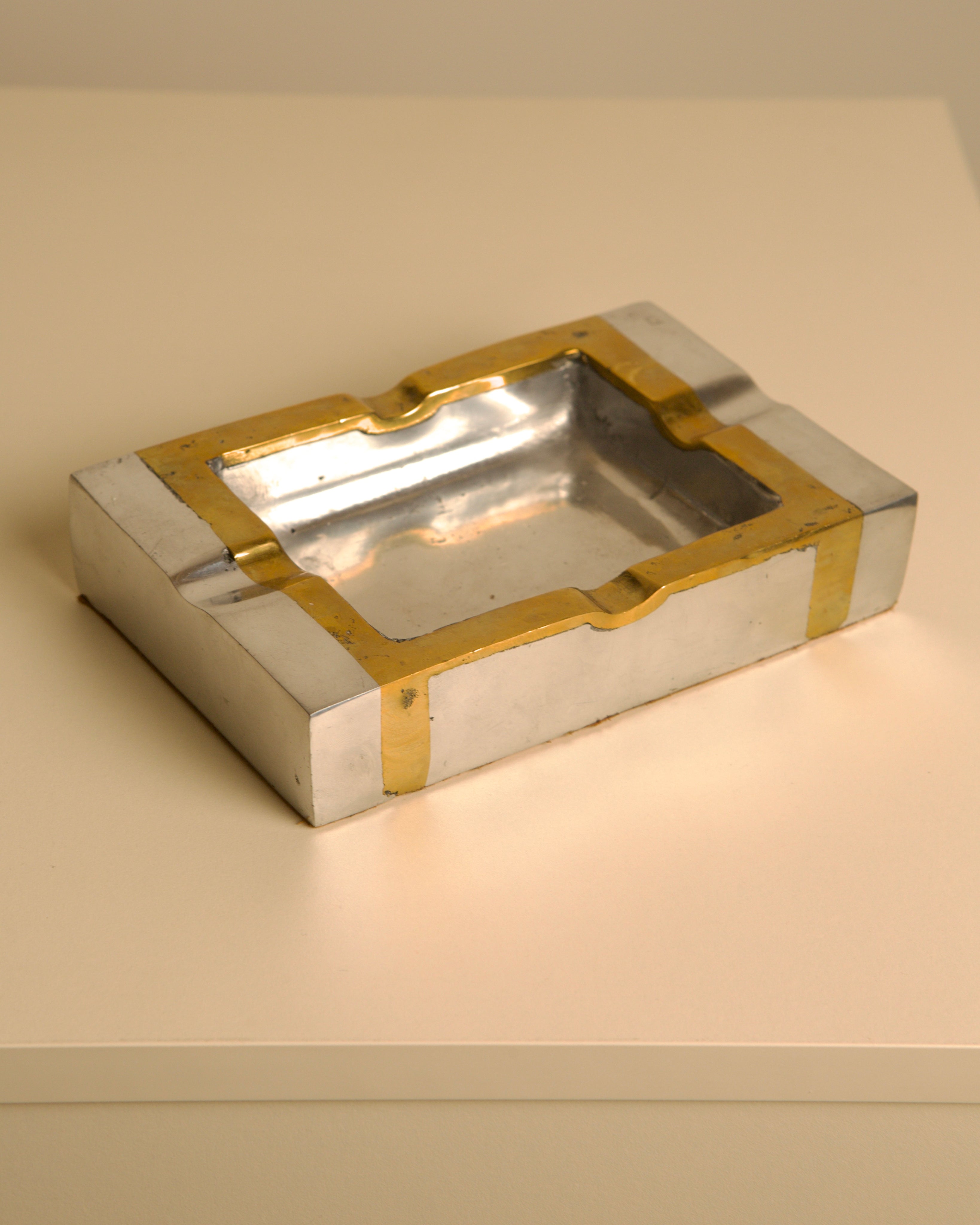 Brutalist brass and silver ashtray by David Marshall, detail view