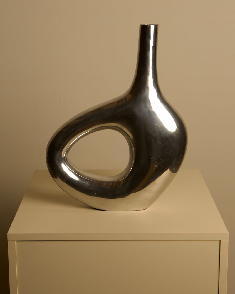 Large Italian cast aluminum vase from the 80s by Treaptyque | The Oblist — polished silver finish