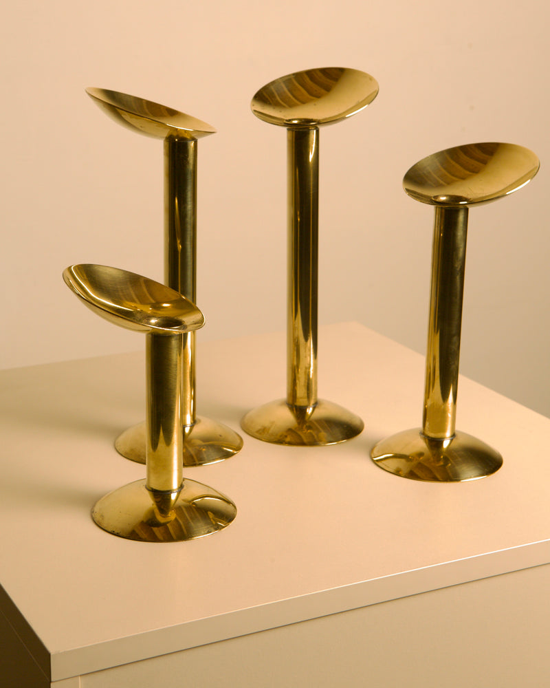 Set of 4 Danish brass candlesticks from the 1960s — detail view